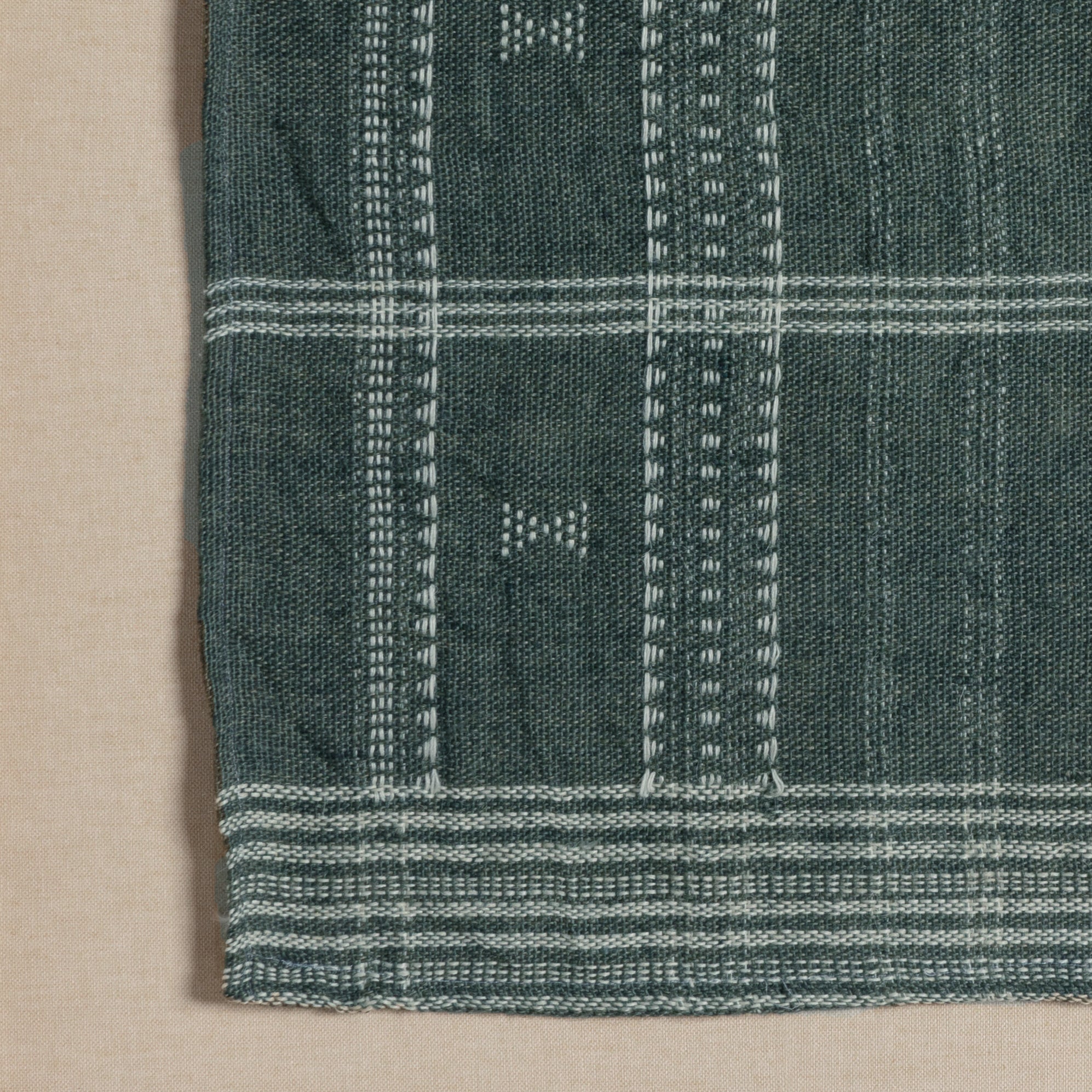 Featuring Bhujodi Cornflower Blue W/ White Oak Textile by Four Hands at Amethyst Home. A 500-year-old tradition comes to life on this 100% wool, handwoven textile. Crafted on a traditional frame loom following a tradition created by the Vankars of the Bhujodi village in India, a process that can take up to two days to complete. Finished with fringe tassel. Amethyst Home provides interior design, new home construction design consulting, vintage area rugs, and lighting in the Los Angeles metro area.