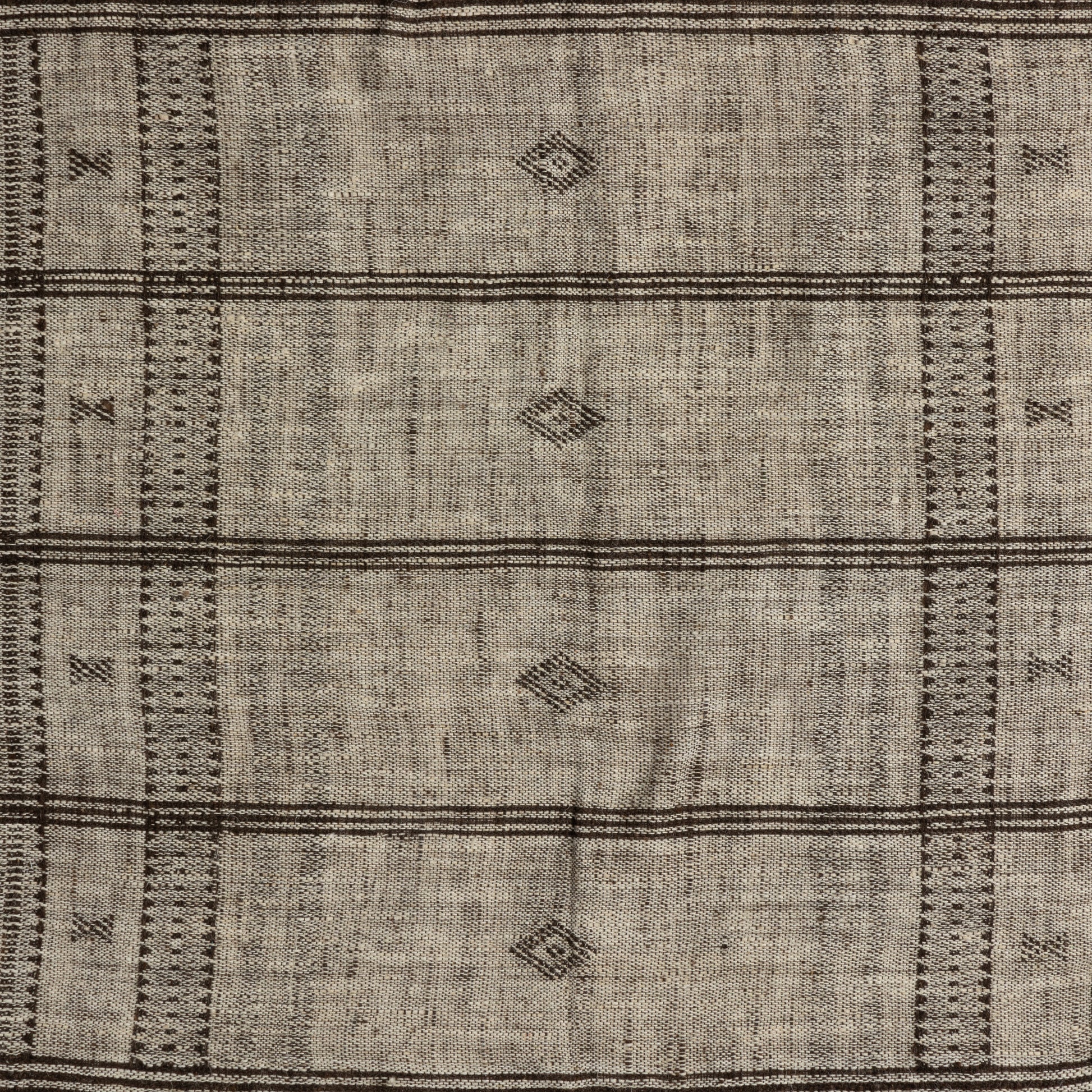 A 500-year-old tradition comes to life on this 100% wool, handwoven textile. Crafted on a traditional frame loom following a tradition created by the Vankars of the Bhujodi village in India, a process that can take up to two days to complete. Finished with fringe tassels on both ends. If not currently in stock, this piece ships within three weeks. Amethyst Home provides interior design, new home construction design consulting, vintage area rugs, and lighting in the San Diego metro area.