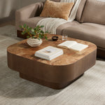 Featuring Blanco Warm Umber Burl Coffee Table by Four Hands at Amethyst Home. Made from warm-toned burl, a soft-squared tabletop features a patchwork pattern to bring novel movement to the modern coffee table. Veneer sides and an inset base complete a beautifully light look.Overall Dimensions: 40"W x 40"L x 16"H
Collection: WessonColors: Dark Mahogany ,Black Plywood ,Warm Umber . Amethyst Home provides interior design, new construction, custom furniture, and area rugs in the Washington metro area.