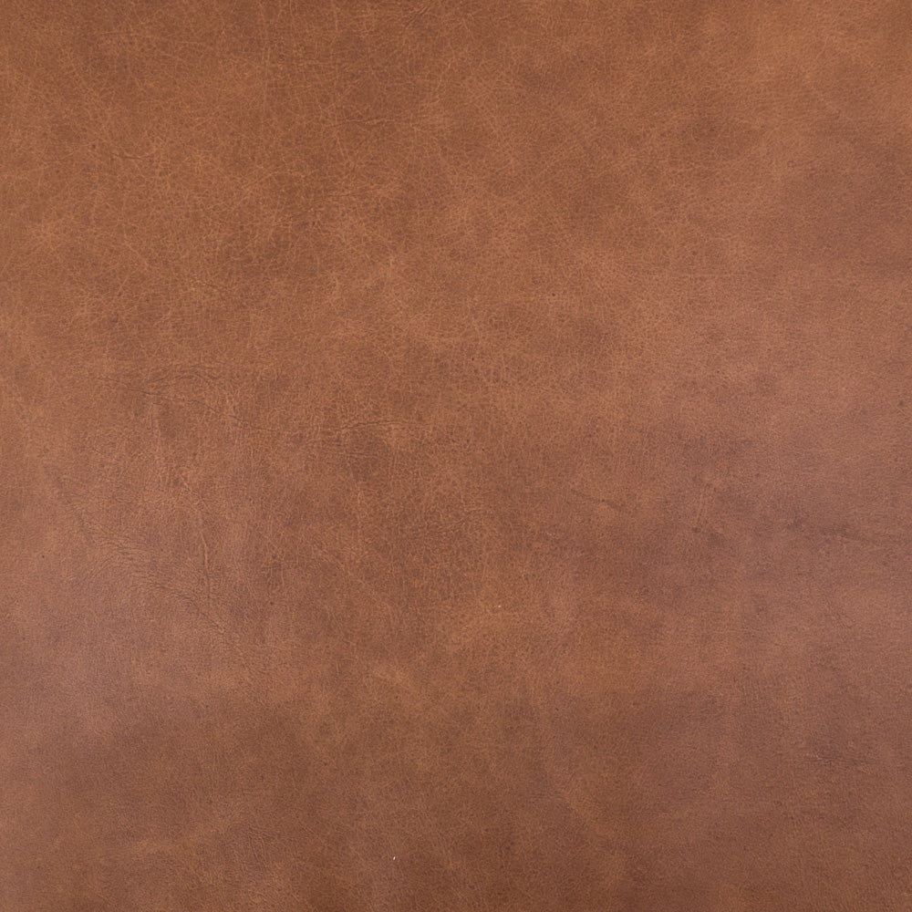 Dramatic arms and a deeper seat offer relaxation with mid-century modern sophistication. Sculpted nettlewood frame adds an architectural feel to brandy top-grain leather. Amethyst Home provides interior design, new construction, custom furniture, and area rugs in the Kansas City metro area.