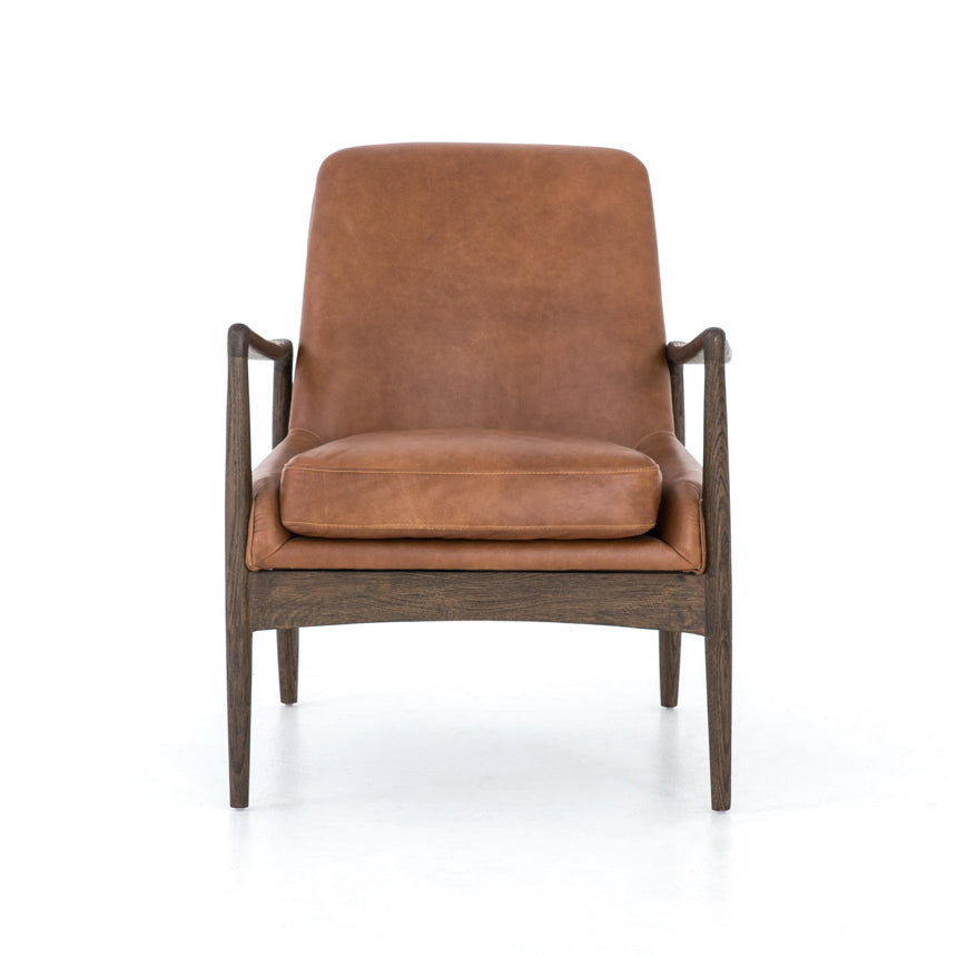 Dramatic arms and a deeper seat offer relaxation with mid-century modern sophistication. Sculpted nettlewood frame adds an architectural feel to brandy top-grain leather. Amethyst Home provides interior design, new construction, custom furniture, and area rugs in the Los Angeles metro area.
