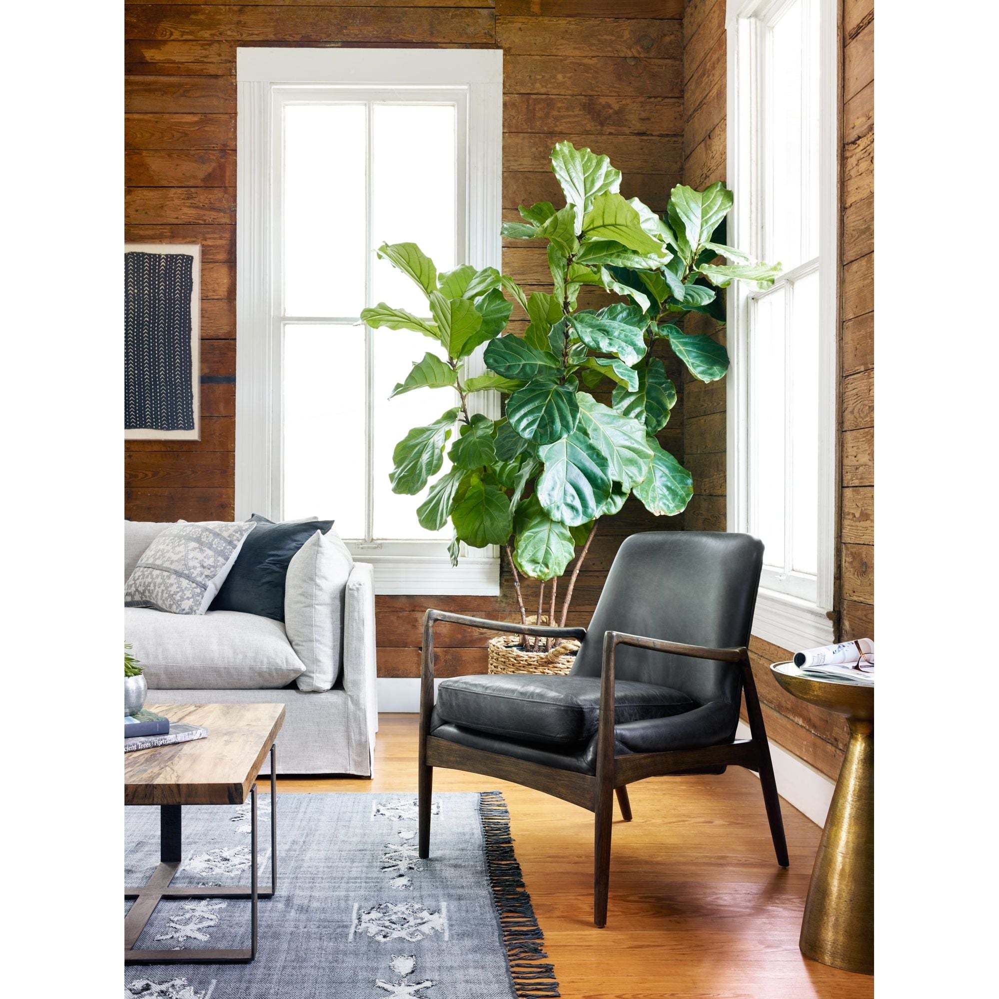 Featuring Braden Durango Smoke Chair by Four Hands at Amethyst Home. Dramatic arms and a deeper seat offer relaxation with mid-century modern sophistication. Sculpted frame adds an architectural feel to rich, black top-grain leather.Overall Dimensions: 27.25"W x 30.25"L x 32.25"H
Collection: AshfordColors: Durango Smoke ,Warm OakMaterials: Top Grain Leather ,Solid Oak Weight: 29.32 . Amethyst Home provides interior design, new construction, custom furniture, and area rugs in the Boston metro area.