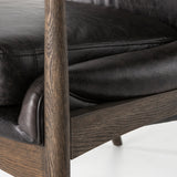 Featuring Braden Durango Smoke Chair by Four Hands at Amethyst Home. Dramatic arms and a deeper seat offer relaxation with mid-century modern sophistication. Sculpted frame adds an architectural feel to rich, black top-grain leather.Overall Dimensions: 27.25"W x 30.25"L x 32.25"H
Collection: AshfordColors: Durango Smoke ,Warm OakMaterials: Top Grain Leather ,Solid Oak Weight: 29. Amethyst Home provides interior design, new construction, custom furniture, and area rugs in the Des Moines metro area.