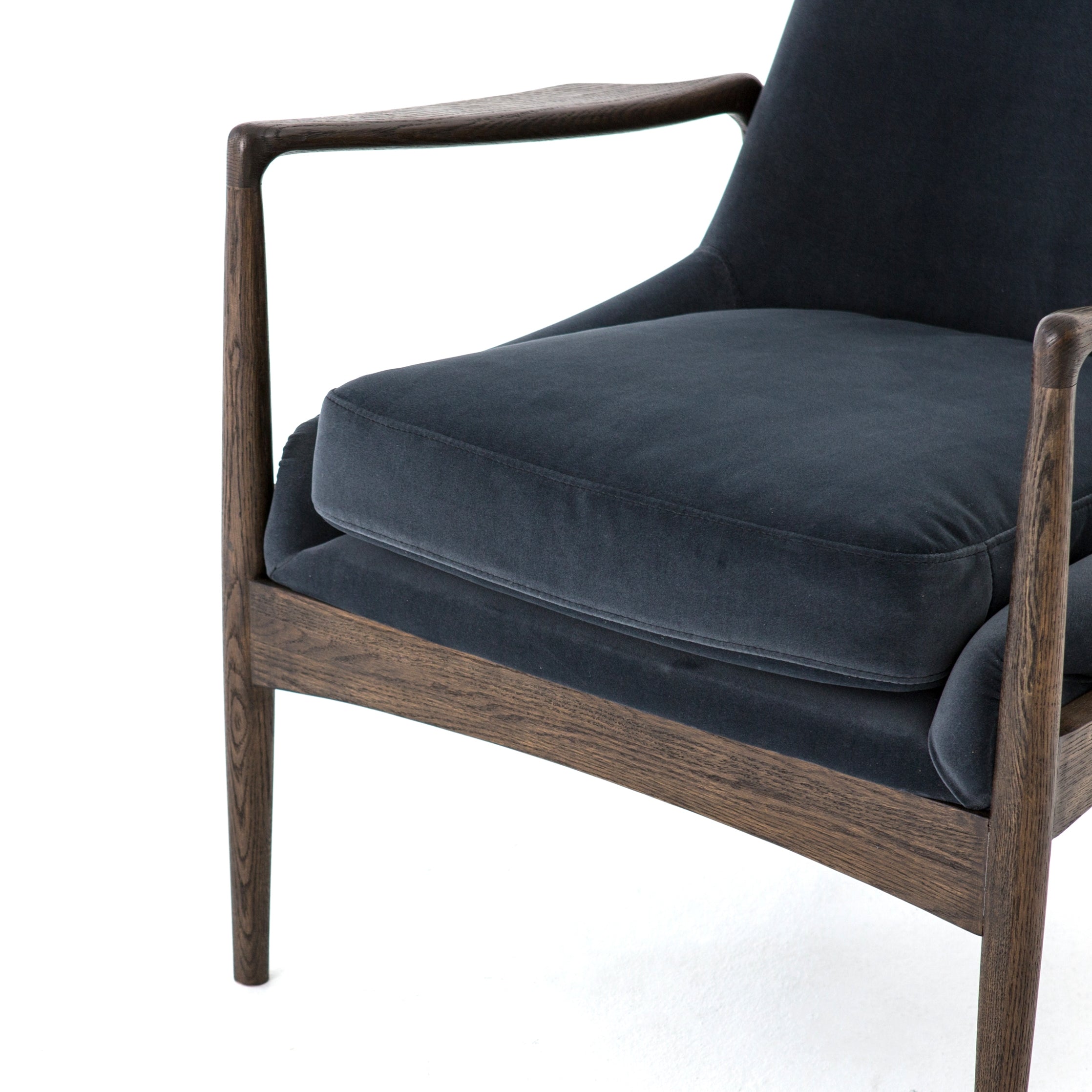 Featuring Braden Modern Velvet Shadow Chair by Four Hands at Amethyst Home. Dramatic arms and deep seat offer relaxation with mid-century modern sophistication. Sculpted cedar frame adds an architectural feel to neutral-toned velvet upholstery.Overall Dimensions: 27.25"W x 30.25"L x 32.25"H
Collection: AshfordColors: Modern Velvet Shadow ,Warm OakMaterials: 100% Polyester ,Solid . Amethyst Home provides interior design, new construction, custom furniture, and area rugs in the Nashville metro area.