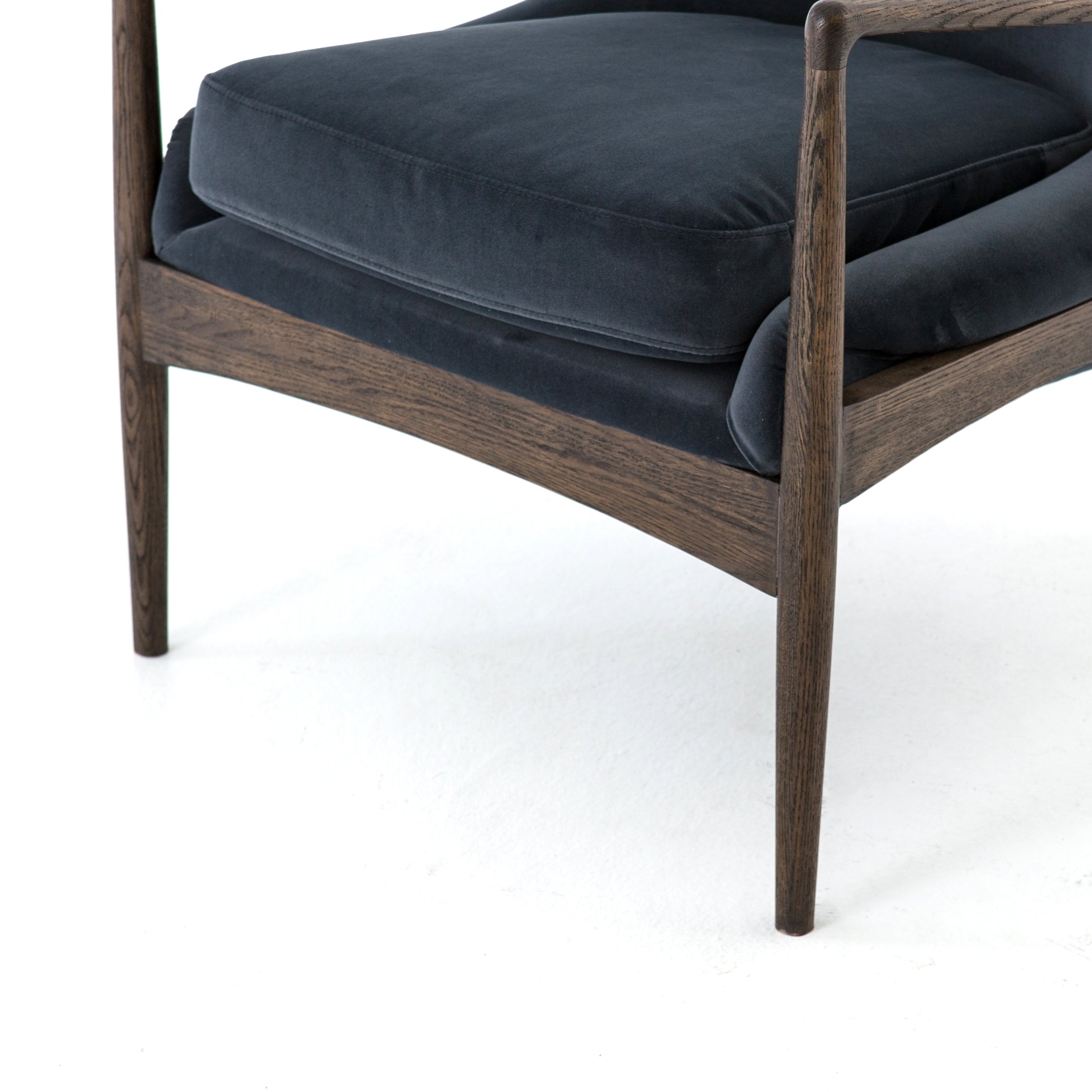 Featuring Braden Modern Velvet Shadow Chair by Four Hands at Amethyst Home. Dramatic arms and deep seat offer relaxation with mid-century modern sophistication. Sculpted cedar frame adds an architectural feel to neutral-toned velvet upholstery.Overall Dimensions: 27.25"W x 30.25"L x 32.25"H
Collection: AshfordColors: Modern Velvet Shadow ,Warm OakMaterials: 100% Polyester ,Solid. Amethyst Home provides interior design, new construction, custom furniture, and area rugs in the Scottsdale metro area.