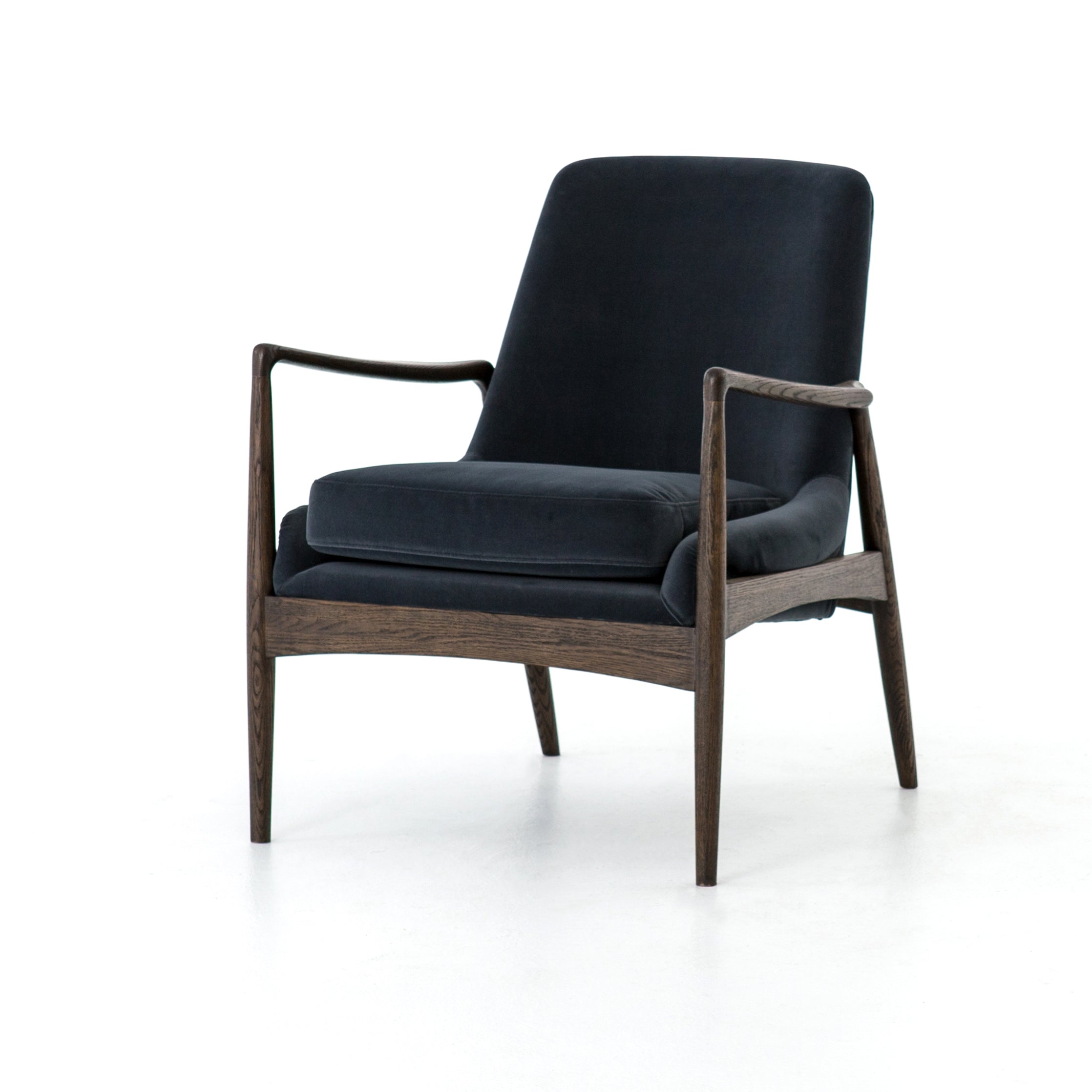 Featuring Braden Modern Velvet Shadow Chair by Four Hands at Amethyst Home. Dramatic arms and deep seat offer relaxation with mid-century modern sophistication. Sculpted cedar frame adds an architectural feel to neutral-toned velvet upholstery.Overall Dimensions: 27.25"W x 30.25"L x 32.25"H
Collection: AshfordColors: Modern Velvet Shadow ,Warm OakMaterials: 100% Polyester ,Solid Oak . Amethyst Home provides interior design, new construction, custom furniture, and area rugs in the Tampa metro area.