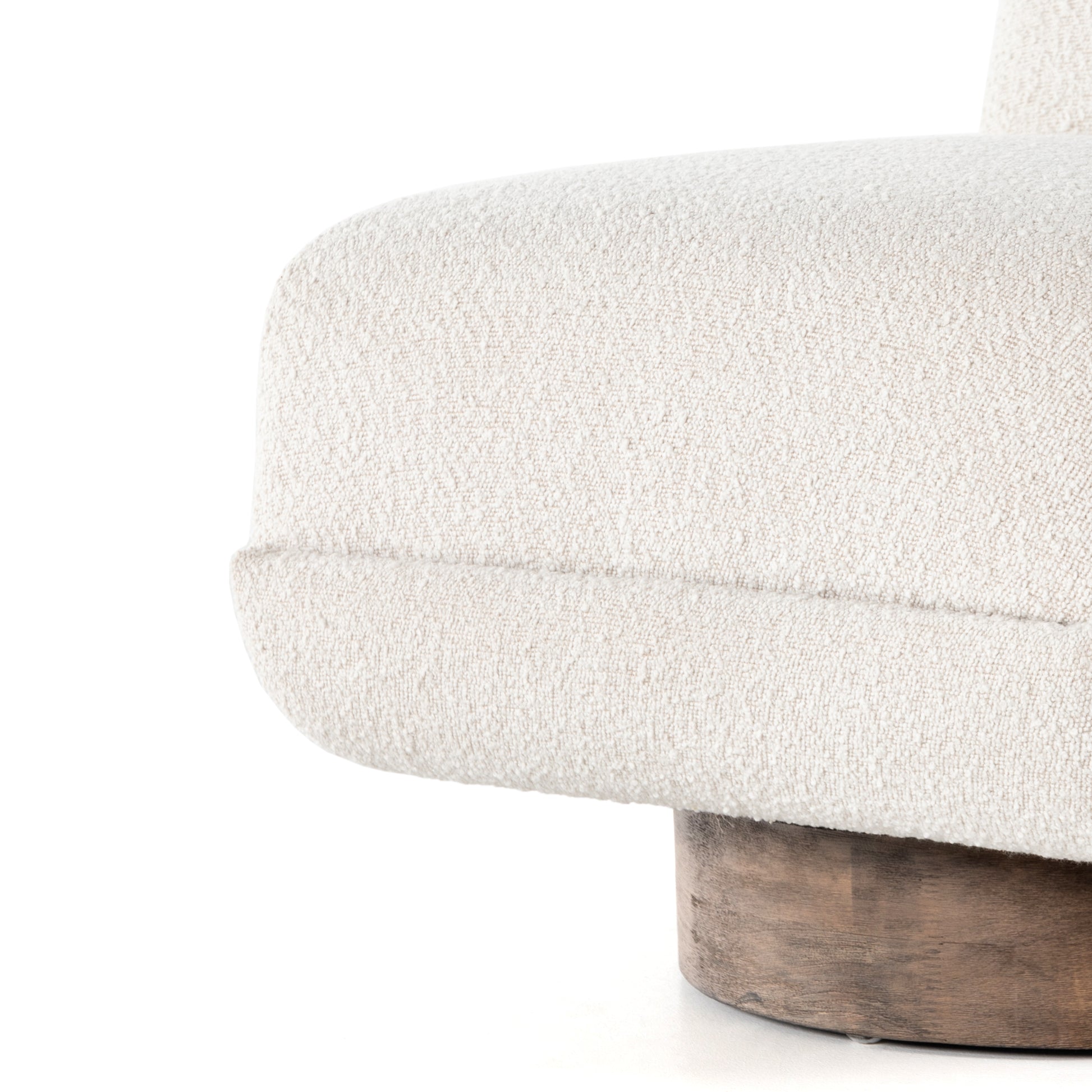 A stylish play on function. With chunky, cream-colored upholstery, armless accent seating tops a parawood 360-degree swivel base, wire-brushed for vintage vibes. Option to pair with matching side table, which can be fastened or removed from either side with ease. Amethyst Home provides interior design, new construction, custom furniture, and area rugs in the Kansas City metro area.