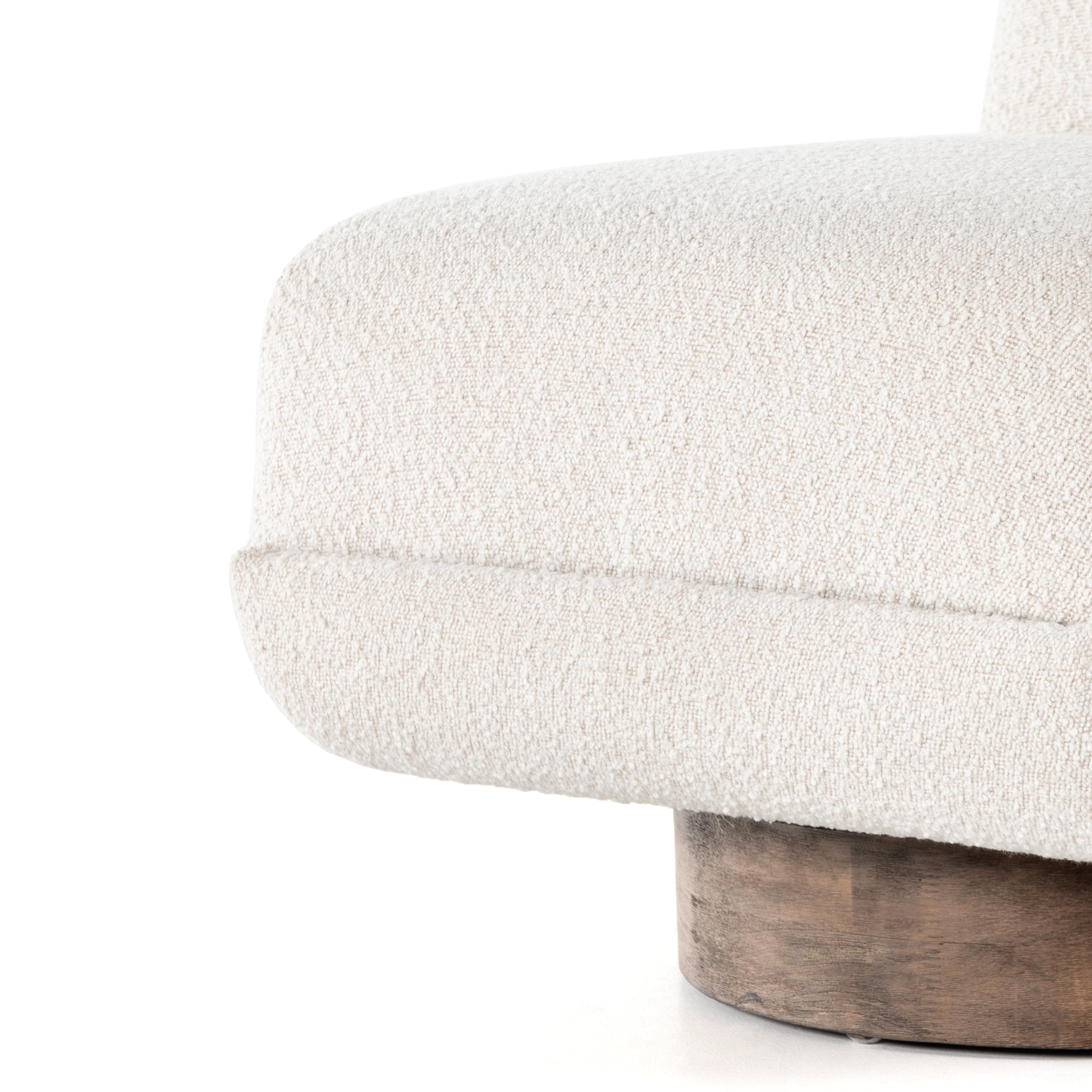 A stylish play on function. With chunky, cream-colored upholstery, armless accent seating tops a parawood 360-degree swivel base, wire-brushed for vintage vibes. Option to pair with matching side table, which can be fastened or removed from either side with ease. Amethyst Home provides interior design, new construction, custom furniture, and area rugs in the Kansas City metro area.