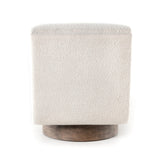 Featuring Bronwyn Knoll Natural Swivel Chair by Four Hands at Amethyst Home. A stylish play on function. With chunky, cream-colored upholstery, armless accent seating tops a parawood 360-degree swivel base, wire-brushed for vintage vibes. Option to pair with matching side table, which can be fastened or removed from either side with ease.Overall Dimensions: 25"W x 39"L x 31.50". Amethyst Home provides interior design, new construction, custom furniture, and area rugs in the Los Angeles metro area.