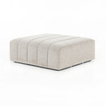 Featuring Langham Napa Sandstone Ottoman by Four Hands at Amethyst Home. Wide, vertical channels and low styling speaks to modish Italian influence. Sandstone-colored covering and modular components allow for versatility in any space. Ottoman to matching sectional. Performance fabrics are specially created to withstand spills, stains, high traffic and wea. Amethyst Home provides interior design, new home construction design consulting, vintage area rugs, and lighting in the Los Angeles metro area.