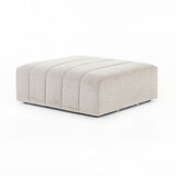 Featuring Langham Napa Sandstone Ottoman by Four Hands at Amethyst Home. Wide, vertical channels and low styling speaks to modish Italian influence. Sandstone-colored covering and modular components allow for versatility in any space. Ottoman to matching sectional. Performance fabrics are specially created to withstand spills, stains, high traffic and wea. Amethyst Home provides interior design, new home construction design consulting, vintage area rugs, and lighting in the Los Angeles metro area.