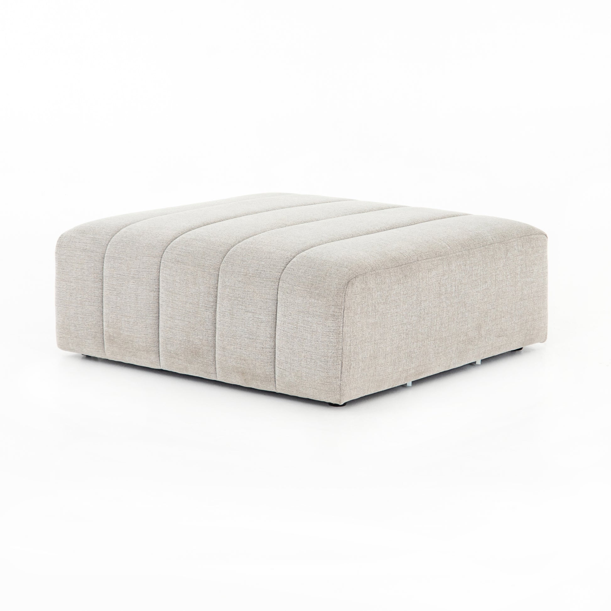 Wide, vertical channels and low styling speaks to modish Italian influence. Sandstone-colored covering and modular components allow for versatility in any space. Ottoman to matching sectional. Performance fabrics are specially created to withstand spills, stains, high traffic and wear, ensuring long-term comfort and unmatched durability. Amethyst Home provides interior design, new home construction design consulting, vintage area rugs, and lighting in the Los Angeles metro area.