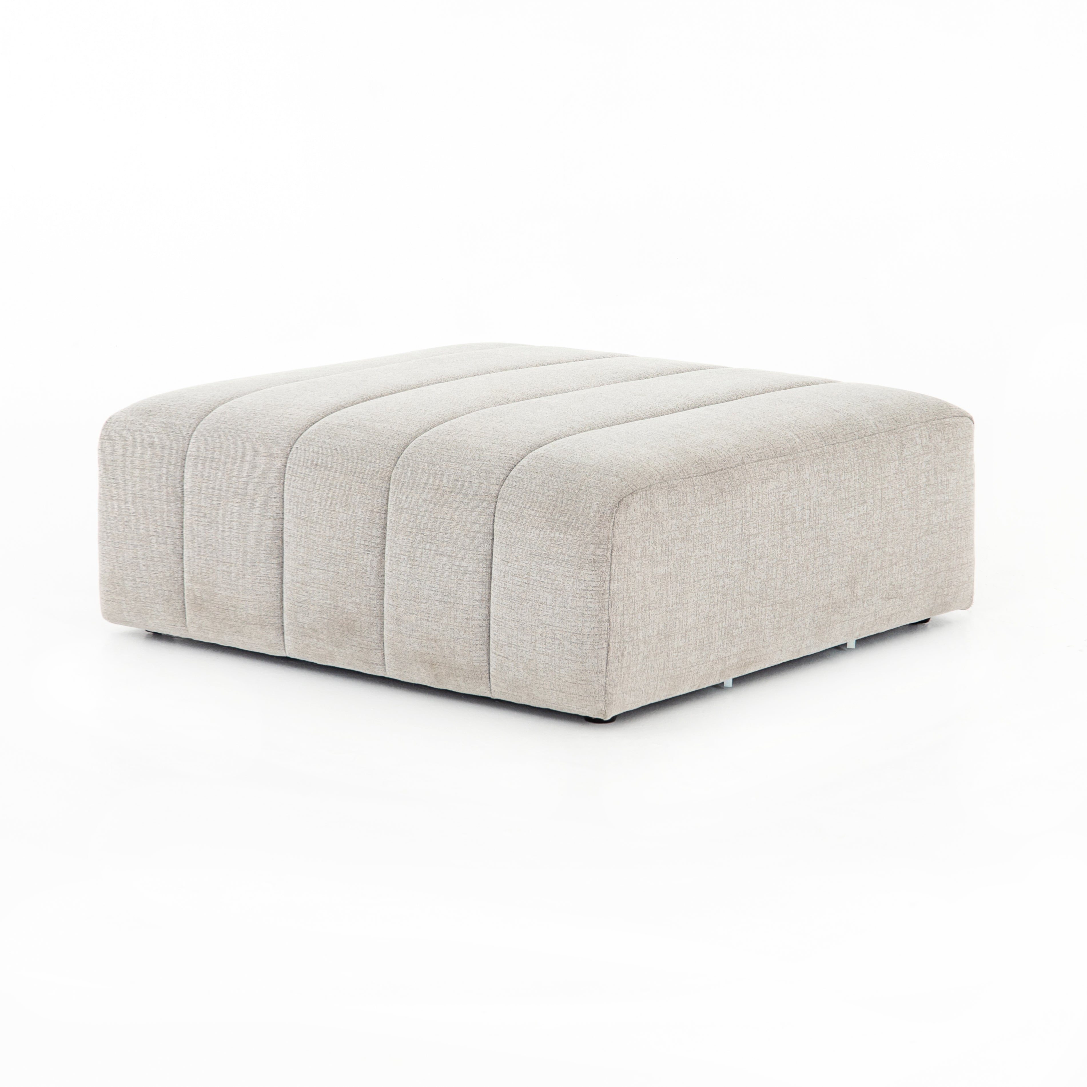 Wide, vertical channels and low styling speaks to modish Italian influence. Sandstone-colored covering and modular components allow for versatility in any space. Ottoman to matching sectional. Performance fabrics are specially created to withstand spills, stains, high traffic and wear, ensuring long-term comfort and unmatched durability. Amethyst Home provides interior design, new home construction design consulting, vintage area rugs, and lighting in the Los Angeles metro area.