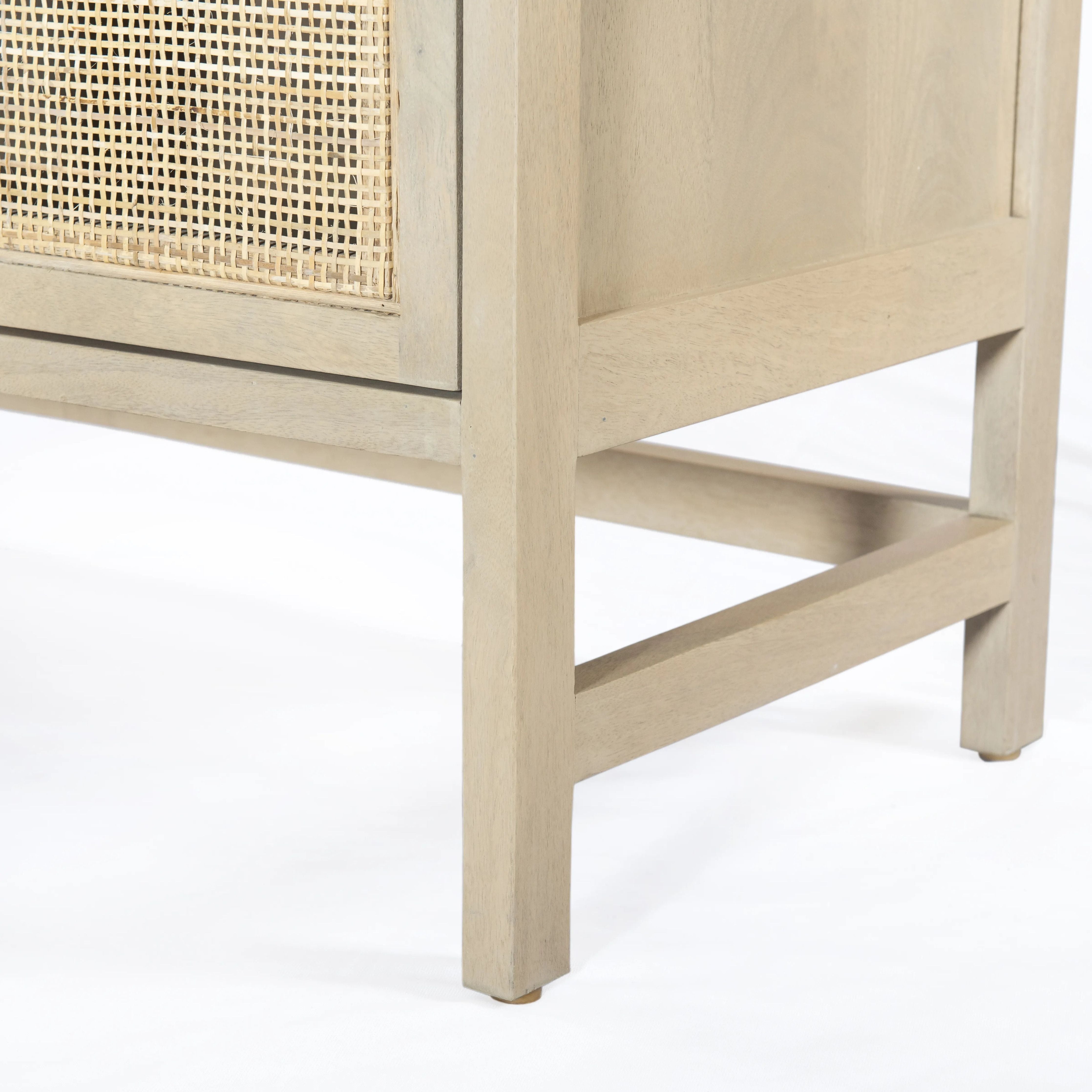 Featuring Caprice Natural Mango Sideboard by Four Hands at Amethyst Home. Monochromatic with a textural twist. Natural mango frames woven cane fronts, with black iron hardware for subtle contrast. Inside, spacious shelving awaits storage of dinnerware and more.Overall Dimensions: 72"W x 17"L x 33"H
Collection: LeightonColors: Natural Mango ,Gunmetal ,Na. Amethyst Home provides interior design, new home construction design consulting, vintage area rugs, and lighting in the Newport Beach metro area.