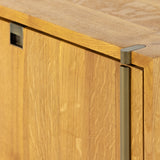 Style meets simplicity in this Danish-inspired design. A light solid oak console features squared iron hardware finished in a satin brass, bringing ample space to modern media storage. Posterior cutouts for cord management. Amethyst Home provides interior design, new construction, custom furniture, and area rugs in the Boston metro area.