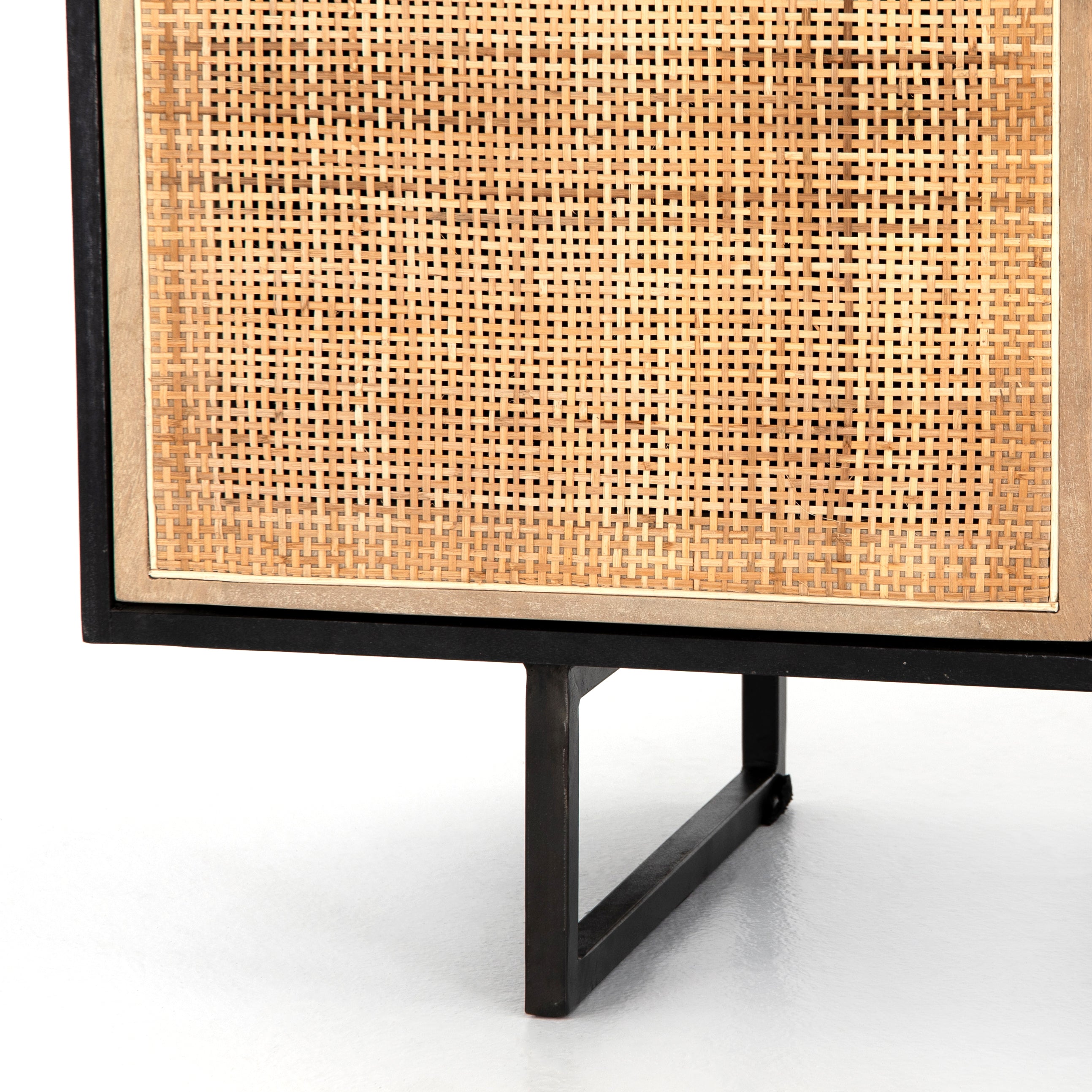 Featuring Carmel Black Wash Sideboard by Four Hands at Amethyst Home. Mid-century-inspired style with an organic twist. Surrounded by black mango casing, light cane weaves for a fresh, high-contrast look with natural depth. Angular gunmetal-finished iron legs offer an intriguing contrast of texture and tone.Overall Dimensions: 72"W x 18"L x 31"H
Collection: PrescottColors: Black . Amethyst Home provides interior design, new construction, custom furniture, and area rugs in the Calabasas metro area.