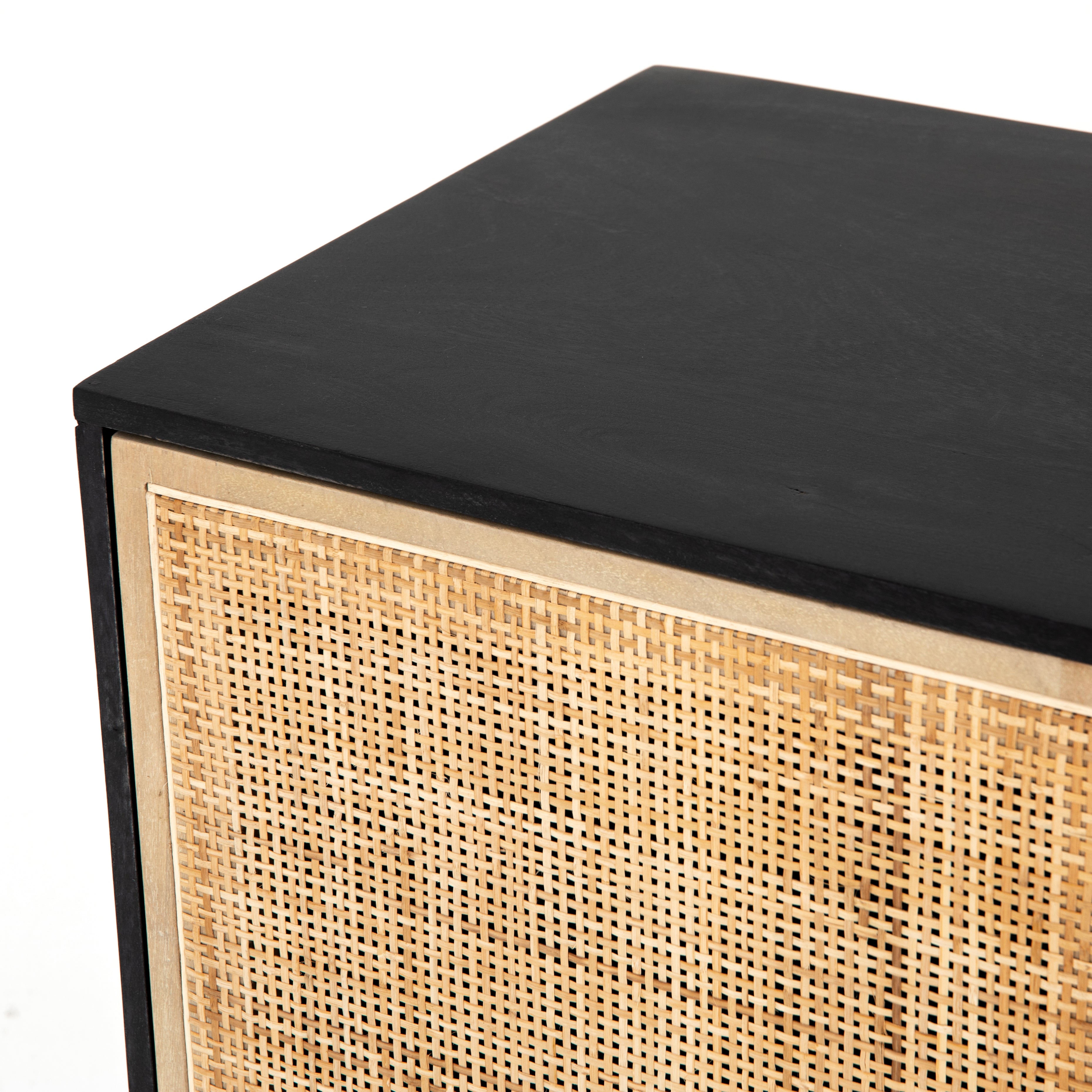 Featuring Carmel Black Wash Sideboard by Four Hands at Amethyst Home. Mid-century-inspired style with an organic twist. Surrounded by black mango casing, light cane weaves for a fresh, high-contrast look with natural depth. Angular gunmetal-finished iron legs offer an intriguing contrast of texture and tone.Overall Dimensions: 72"W x 18"L x 31"H
Collection: PrescottColors: Bla. Amethyst Home provides interior design, new construction, custom furniture, and area rugs in the Laguna Beach metro area.