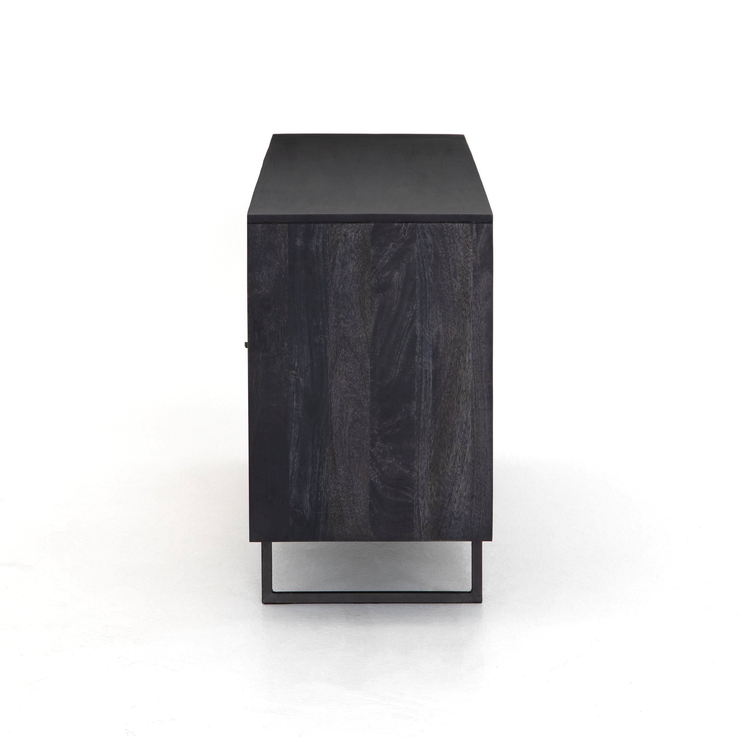 Featuring Carmel Black Wash Sideboard by Four Hands at Amethyst Home. Mid-century-inspired style with an organic twist. Surrounded by black mango casing, light cane weaves for a fresh, high-contrast look with natural depth. Angular gunmetal-finished iron legs offer an intriguing contrast of texture and tone.Overall Dimensions: 72"W x 18"L x 31"H
Collection: PrescottColors: Bl. Amethyst Home provides interior design, new construction, custom furniture, and area rugs in the Newport Beach metro area.