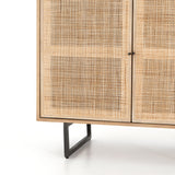 Featuring Carmel Natural Mango Small Cabinet by Four Hands at Amethyst Home. Mid-century style with an organic twist. Surrounded by mango casing, light cane weaves for a fresh look with natural depth. Angular gunmetal-finished iron legs offer an intriguing contrast of texture and tone. Perfect solo or paired up.Overall Dimensions: 35"W x 18"L x 32"HColors: Natural Cane, Natural Mango, Charcoa. Amethyst Home provides interior design services, furniture, rugs, and lighting in the Seattle metro area.