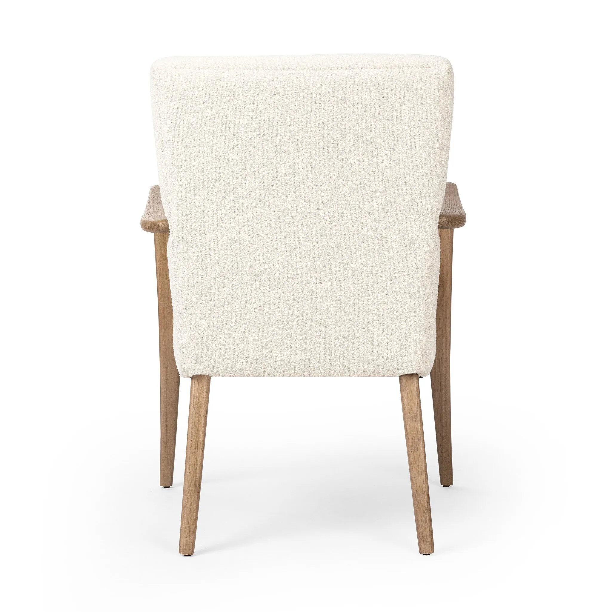 Add timeless midcentury design to your table with this Danish-inspired dining chair. Fluid oak arms and cream upholstery create a chair that embodies both comfort and style.Collection: Ashfor Amethyst Home provides interior design, new home construction design consulting, vintage area rugs, and lighting in the Salt Lake City metro area.