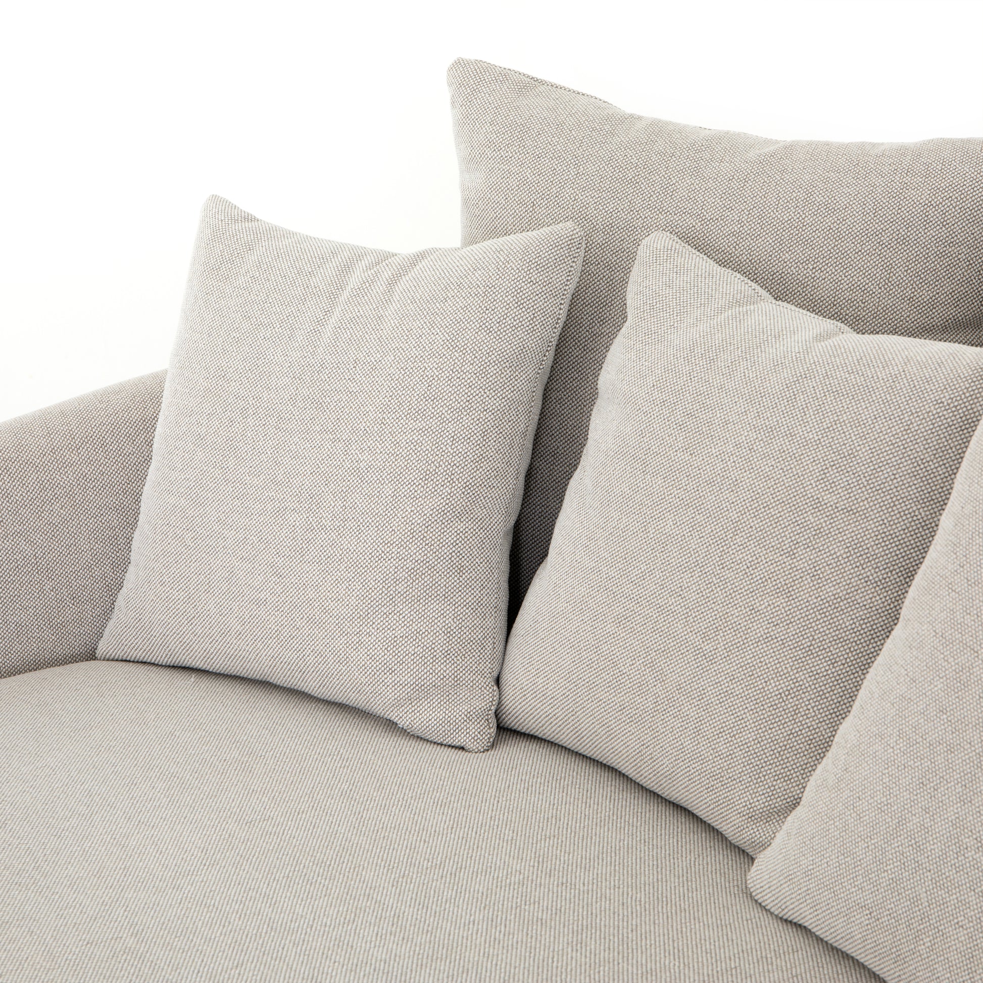 Roomy style. Off-white high-performance fabric covers a dramatic U shape for a spacious, sink-in sit. Throw pillows present an added touch of comfort to this sensibly styled media lounger, perfect for movie nights. Amethyst Home provides interior design, new home construction design consulting, vintage area rugs, and lighting in the Park City metro area.