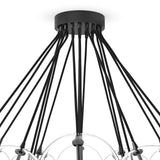 Clear glass bulbs dangle for a statement-making centerpiece. Each globe is individually blown, shaped and sculpted by hand through a one-hour process. The finish on the brass frame is achieved through a specialized process that turns the brass into an almost black hue before the rod is polished smooth. Brass and glass are 98% recyclable. Amethyst Home provides interior design, new home construction design consulting, vintage area rugs, and lighting in the Winter Garden metro area.