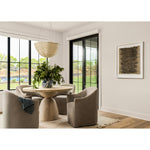 Introducing the Cove Heather Twill Stone Dining Chair, a stylish and feminine update to the traditional barrel chair. The heather twill adds texture and elegance to the design, making it the perfect addition to any modern coastal-inspired home design. Paired with Surya rugs, this chair will transform your dining room into a cozy and inviting space. Whether you're in Nashville, Florida, or Utah, this chair is a must-have for any home design that values both style and comfort.