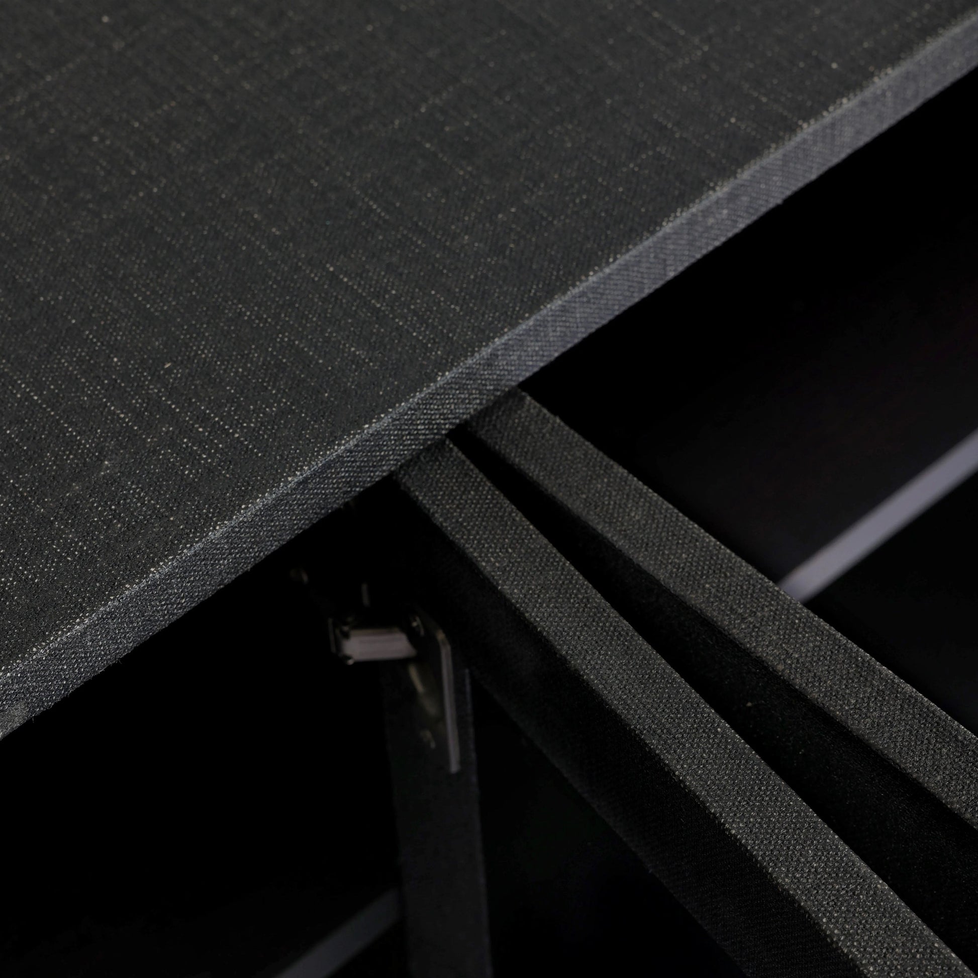 Talk about novelty. Made from painted black linen, arched legs soften otherwise clean, modern shaping. Gunmetal, half-moon iron hardware completes the look. Rear cutouts for cord management Amethyst Home provides interior design, new home construction design consulting, vintage area rugs, and lighting in the Monterey metro area.