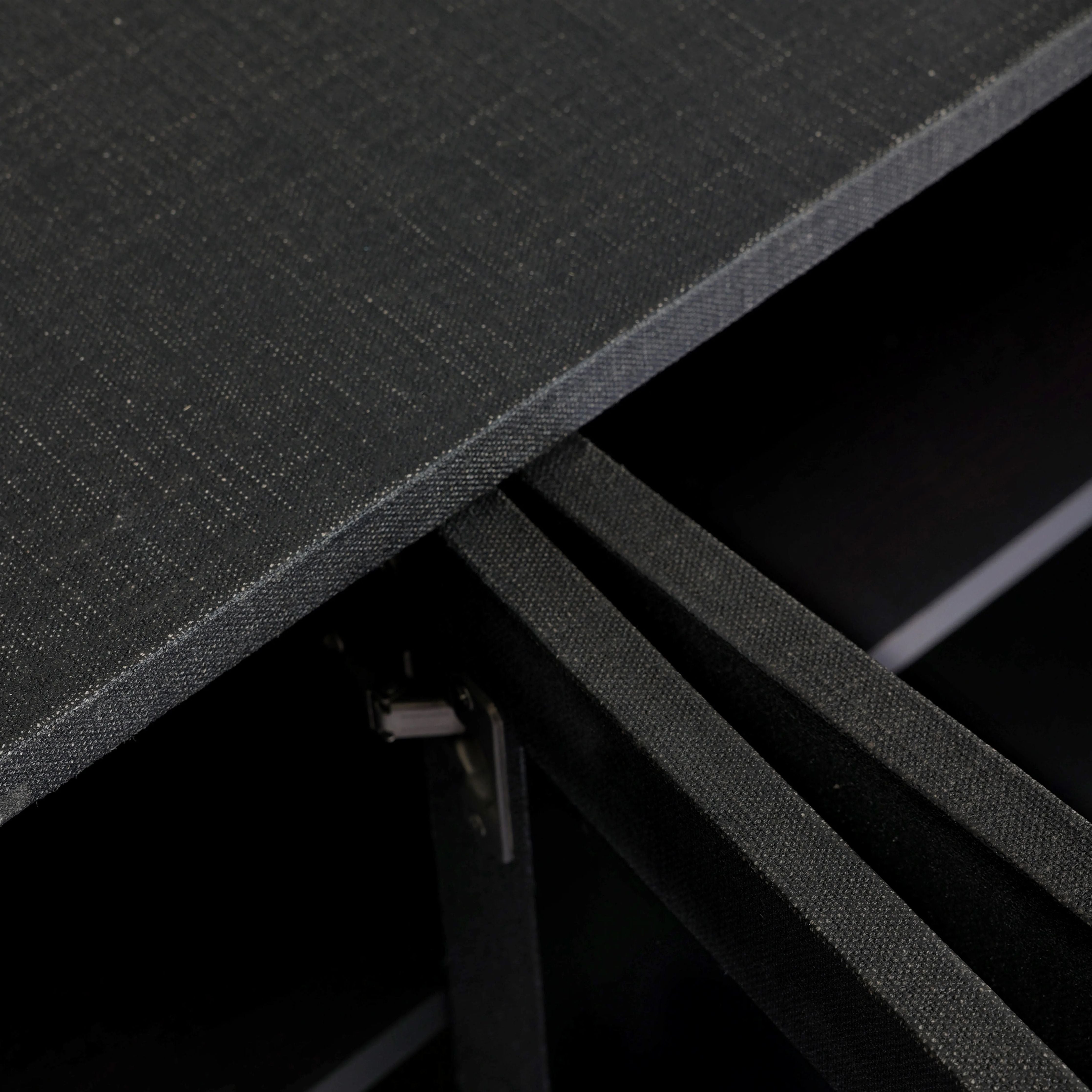 Talk about novelty. Made from painted black linen, arched legs soften otherwise clean, modern shaping. Gunmetal, half-moon iron hardware completes the look. Rear cutouts for cord management Amethyst Home provides interior design, new home construction design consulting, vintage area rugs, and lighting in the Monterey metro area.