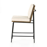 Crisp and clean, with natural panache. Slim, black-finished iron frames a floating ladderback of honey-finished oak and cream-colored high-performance seating. Rear handle detail adds a fashionable finishing touch. Performance fabrics are specially created to withstand spills, stains, high traffic and wear, ensuring long-term comfort and unmatched durability. Amethyst Home provides interior design, new construction, custom furniture, and area rugs in the Dallas metro area.
