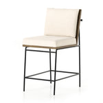 Crisp and clean, with natural panache. Slim, black-finished iron frames a floating ladderback of honey-finished oak and cream-colored high-performance seating. Rear handle detail adds a fashionable finishing touch. Performance fabrics are specially created to withstand spills, stains, high traffic and wear, ensuring long-term comfort and unmatched durability. Amethyst Home provides interior design, new construction, custom furniture, and area rugs in the Newport Beach metro area.