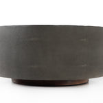 Featuring Crosby Charcoal Round Coffee Table by Four Hands at Amethyst Home. Mixed materials and the simplest of shapes offer a dramatic centerpiece for any space. Reclaimed peroba wood is supported by a textural faux shagreen base in soft grey. This piece is designed in collaboration with Thomas Bina. Four Hands partnership with the renowned Los Angeles furniture designer beg. Amethyst Home provides interior design, new construction, custom furniture, and area rugs in the Laguna Beach metro area.