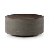 Featuring Crosby Charcoal Round Coffee Table by Four Hands at Amethyst Home. Mixed materials and the simplest of shapes offer a dramatic centerpiece for any space. Reclaimed peroba wood is supported by a textural faux shagreen base in soft grey. This piece is designed in collaboration with Thomas Bina. Four Hands partnership with the renowned Los Angeles furniture designer began in t. Amethyst Home provides interior design, new construction, custom furniture, and area rugs in the Miami metro area.
