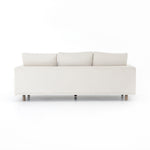 Performance-grade fabric brings surprising livability to a show-stopping silhouette. Pristinely tailored ivory upholstery exudes elegance, with clean track arms and loose feather-blend cushioning for total comfort. Cushions not reversible. Amethyst Home provides interior design, new construction, custom furniture, and area rugs in the Charlotte metro area.