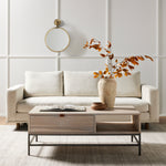 Performance-grade fabric brings surprising livability to a show-stopping silhouette. Pristinely tailored ivory upholstery exudes elegance, with clean track arms and loose feather-blend cushioning for total comfort. Cushions not reversible. Amethyst Home provides interior design, new construction, custom furniture, and area rugs in the Houston metro area.