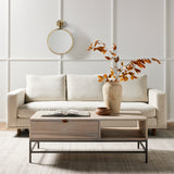 Performance-grade fabric brings surprising livability to a show-stopping silhouette. Pristinely tailored ivory upholstery exudes elegance, with clean track arms and loose feather-blend cushioning for total comfort. Cushions not reversible. Amethyst Home provides interior design, new construction, custom furniture, and area rugs in the Houston metro area.