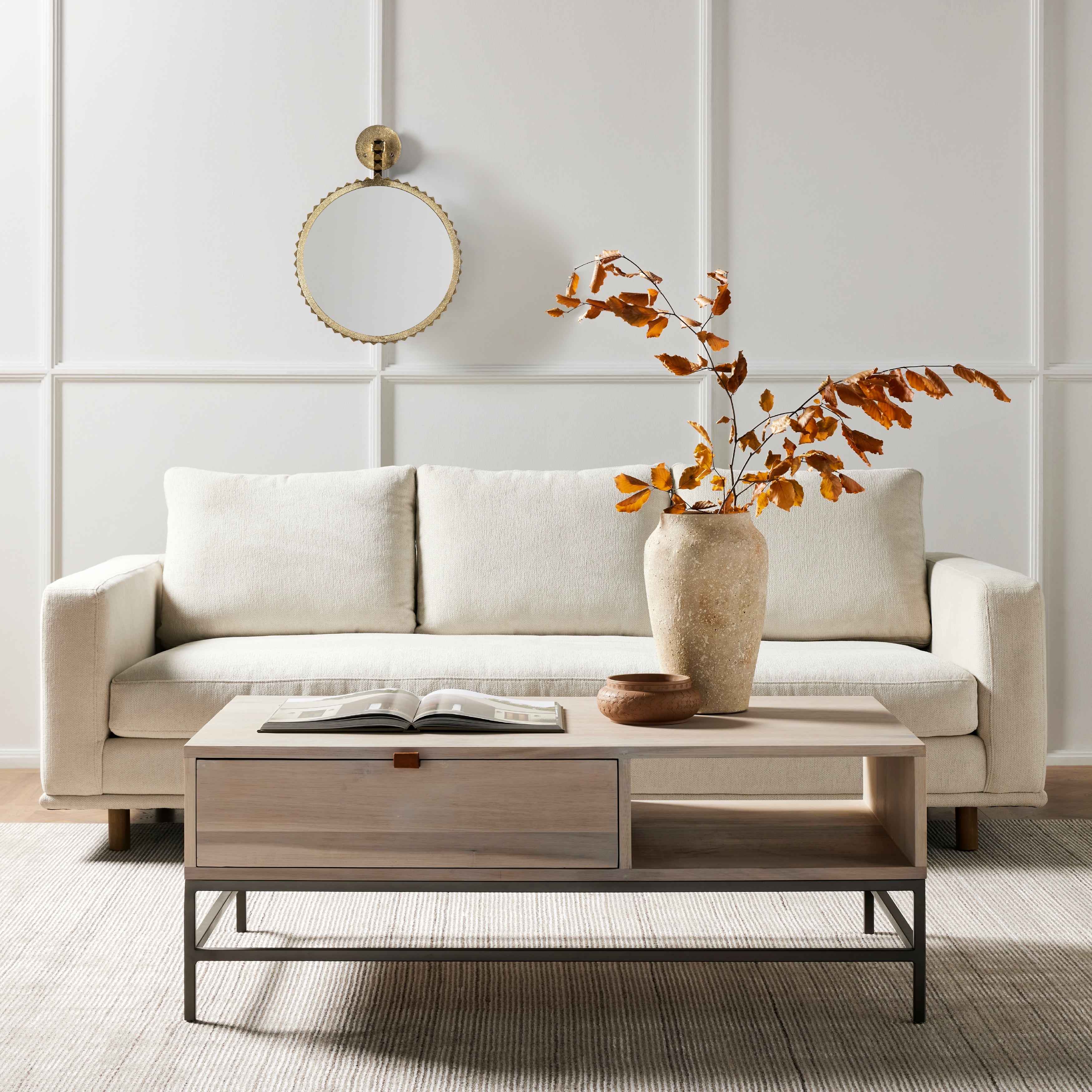 Performance-grade fabric brings surprising livability to a show-stopping silhouette. Pristinely tailored ivory upholstery exudes elegance, with clean track arms and loose feather-blend cushioning for total comfort. Cushions not reversible. Amethyst Home provides interior design, new construction, custom furniture, and area rugs in the Houston metro area.