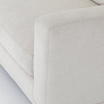 Performance-grade fabric brings surprising livability to a show-stopping silhouette. Pristinely tailored ivory upholstery exudes elegance, with clean track arms and loose feather-blend cushioning for total comfort. Cushions not reversible. Amethyst Home provides interior design, new construction, custom furniture, and area rugs in the Laguna Beach metro area.