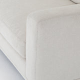 Performance-grade fabric brings surprising livability to a show-stopping silhouette. Pristinely tailored ivory upholstery exudes elegance, with clean track arms and loose feather-blend cushioning for total comfort. Cushions not reversible. Amethyst Home provides interior design, new construction, custom furniture, and area rugs in the Laguna Beach metro area.