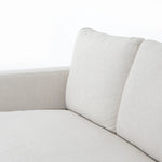 Performance-grade fabric brings surprising livability to a show-stopping silhouette. Pristinely tailored ivory upholstery exudes elegance, with clean track arms and loose feather-blend cushioning for total comfort. Cushions not reversible. Amethyst Home provides interior design, new construction, custom furniture, and area rugs in the Nashville metro area.