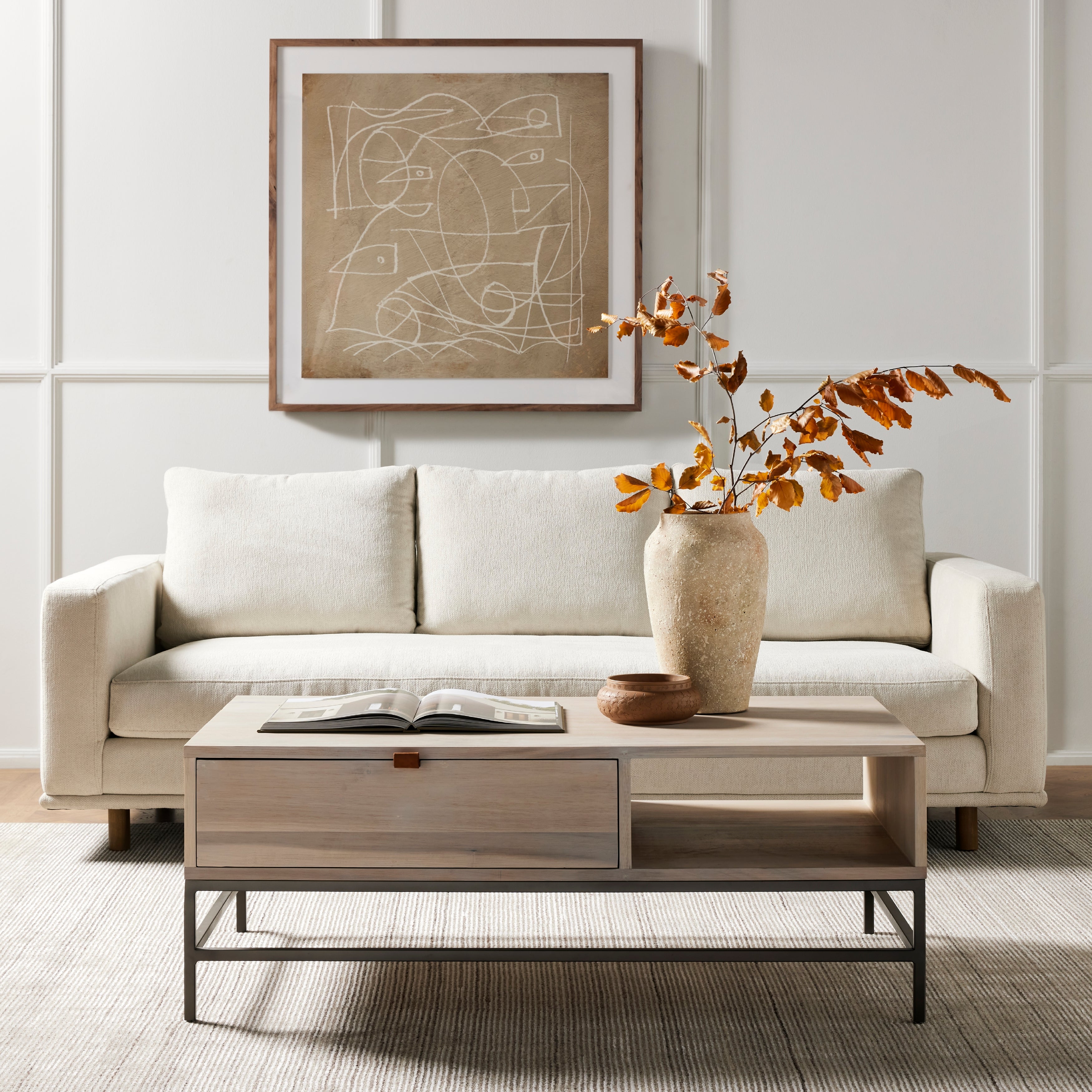 Performance-grade fabric brings surprising livability to a show-stopping silhouette. Pristinely tailored ivory upholstery exudes elegance, with clean track arms and loose feather-blend cushioning for total comfort. Cushions not reversible. Amethyst Home provides interior design, new construction, custom furniture, and area rugs in the Omaha metro area.