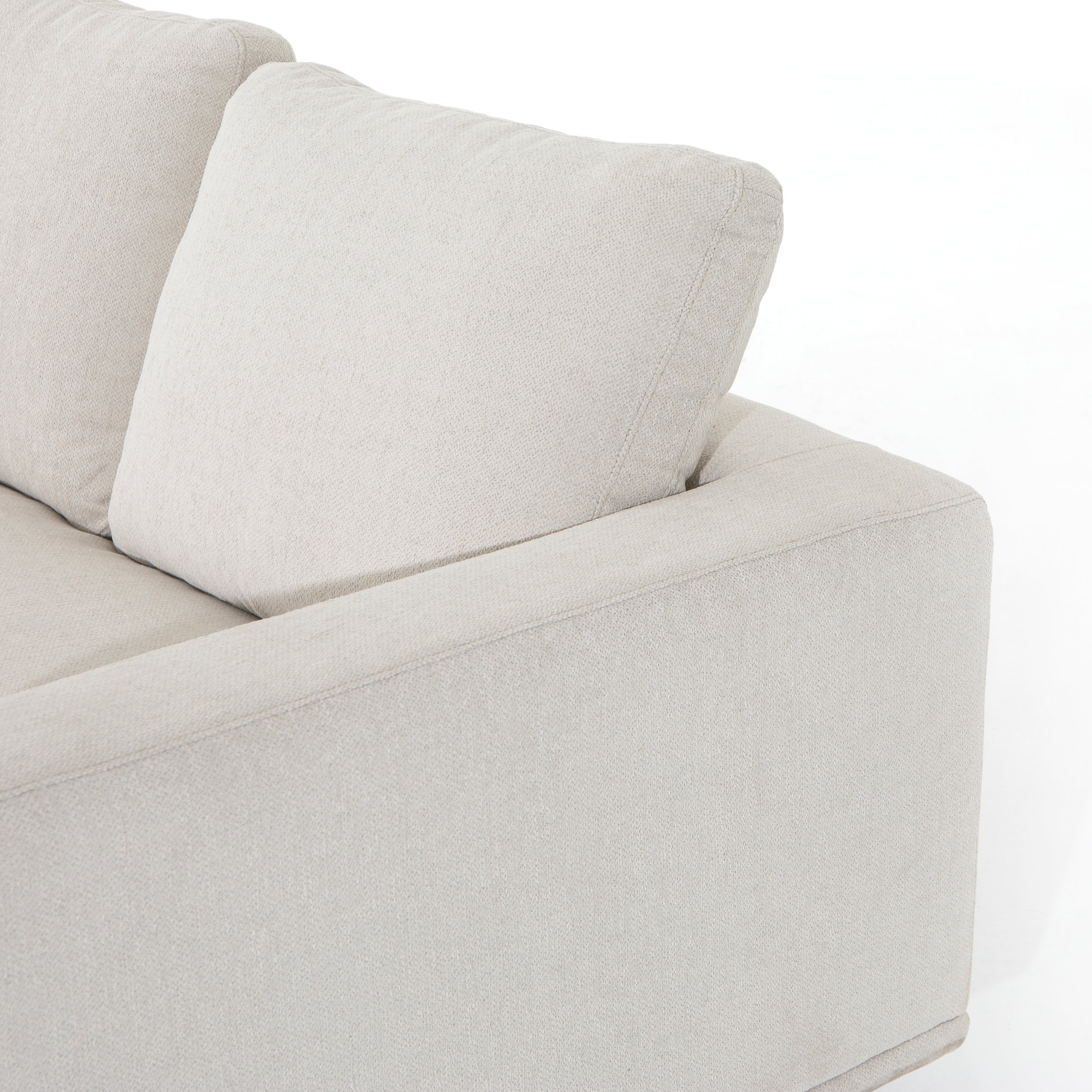 Performance-grade fabric brings surprising livability to a show-stopping silhouette. Pristinely tailored ivory upholstery exudes elegance, with clean track arms and loose feather-blend cushioning for total comfort. Cushions not reversible. Amethyst Home provides interior design, new construction, custom furniture, and area rugs in the Salt Lake City metro area.