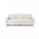 Performance-grade fabric brings surprising livability to a show-stopping silhouette. Pristinely tailored ivory upholstery exudes elegance, with clean track arms and loose feather-blend cushioning for total comfort. Cushions not reversible. Amethyst Home provides interior design, new construction, custom furniture, and area rugs in the Scottsdale metro area.