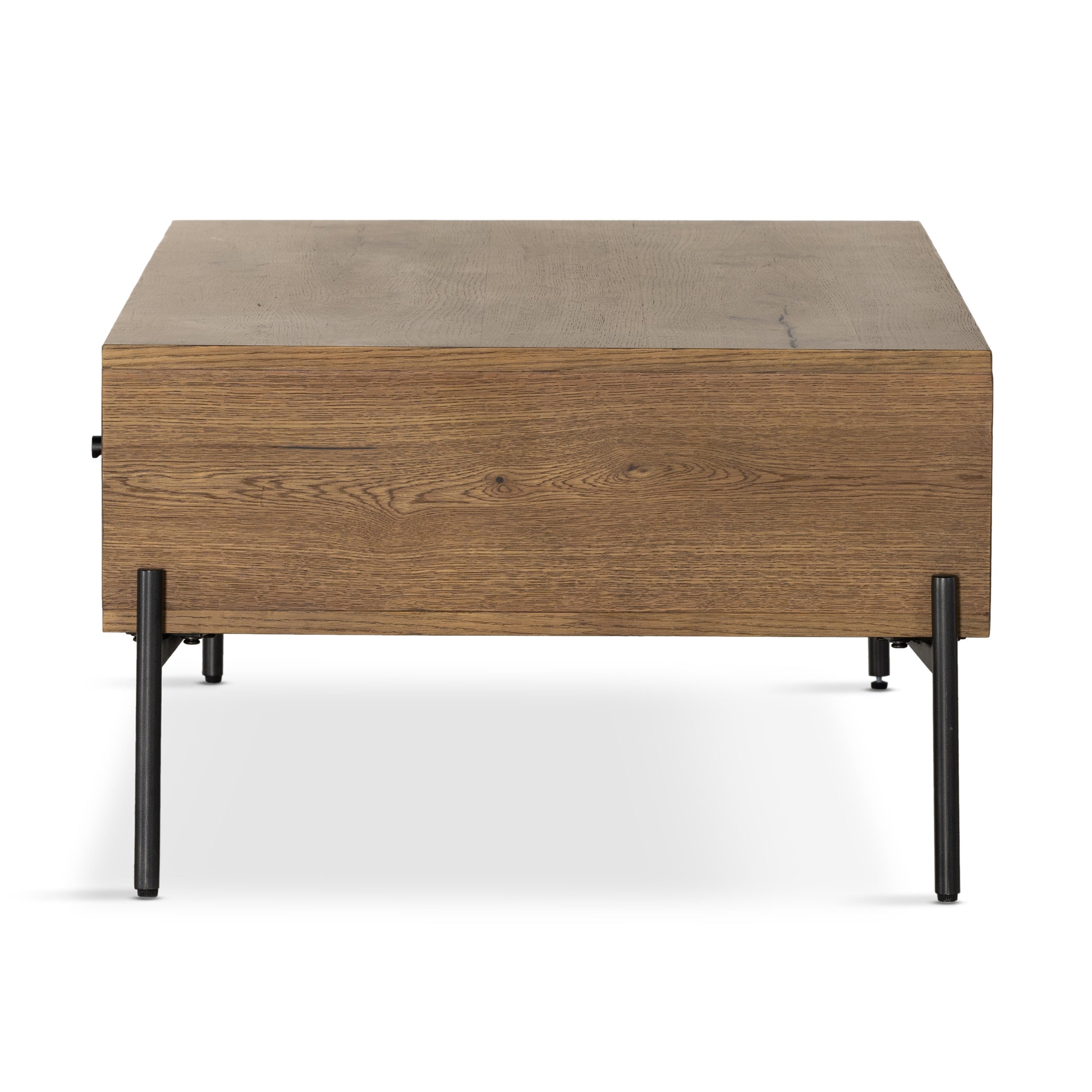 A slight cradle base of gunmetal-finished iron supports a clean-lined coffee table made from thick oak veneer, with dual drawers for extra storage space. For a rich, one-of-a-kind look, black resin fills woods' natural cracks and graining. A subtle variance of resin placement and amount is to be expected, and reflective of materials' character-rich roots. Amethyst Home provides interior design, new construction, custom furniture, and area rugs in the Boston metro area.