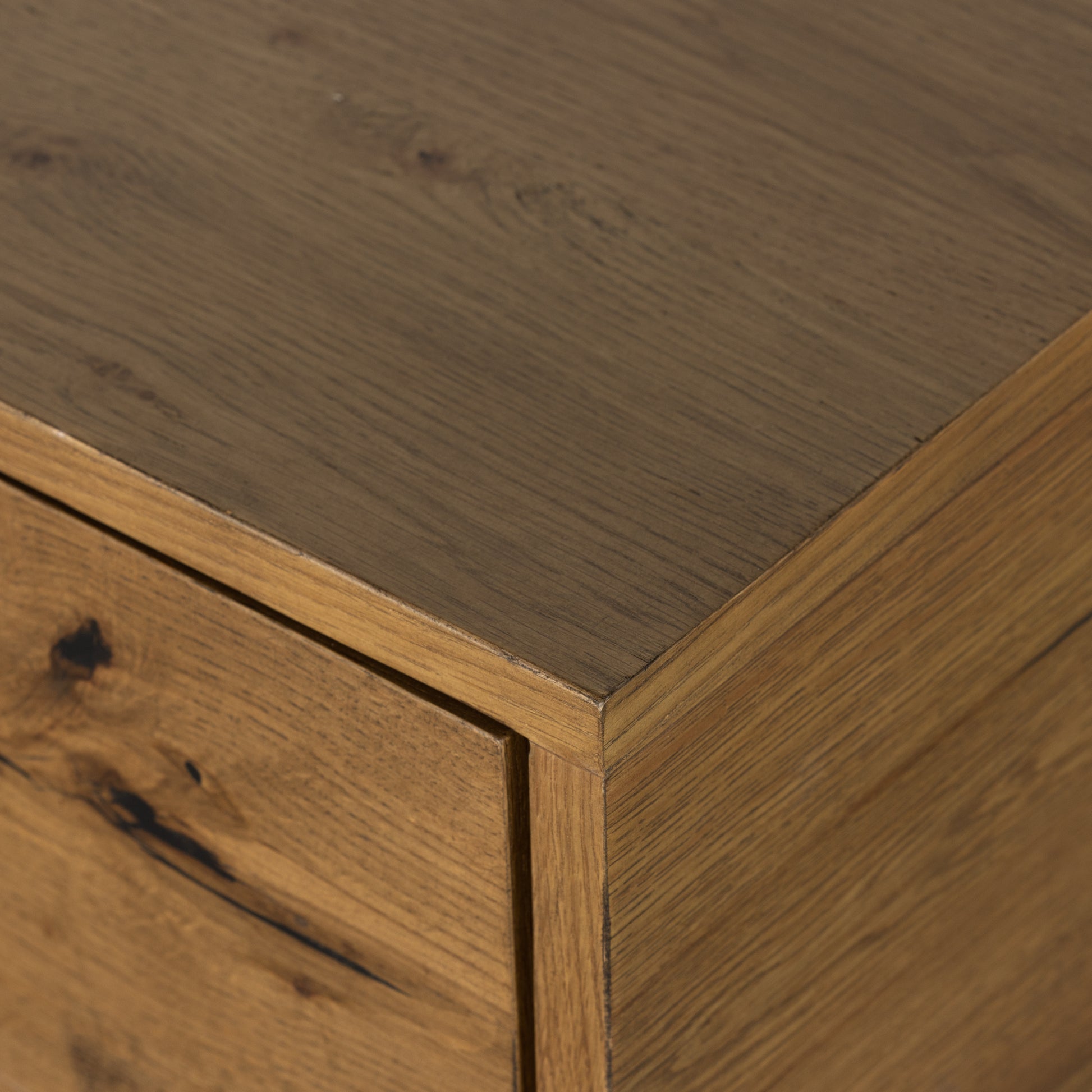 A slight cradle base of gunmetal-finished iron supports a clean-lined coffee table made from thick oak veneer, with dual drawers for extra storage space. For a rich, one-of-a-kind look, black resin fills woods' natural cracks and graining. A subtle variance of resin placement and amount is to be expected, and reflective of materials' character-rich roots. Amethyst Home provides interior design, new construction, custom furniture, and area rugs in the Scottsdale metro area.