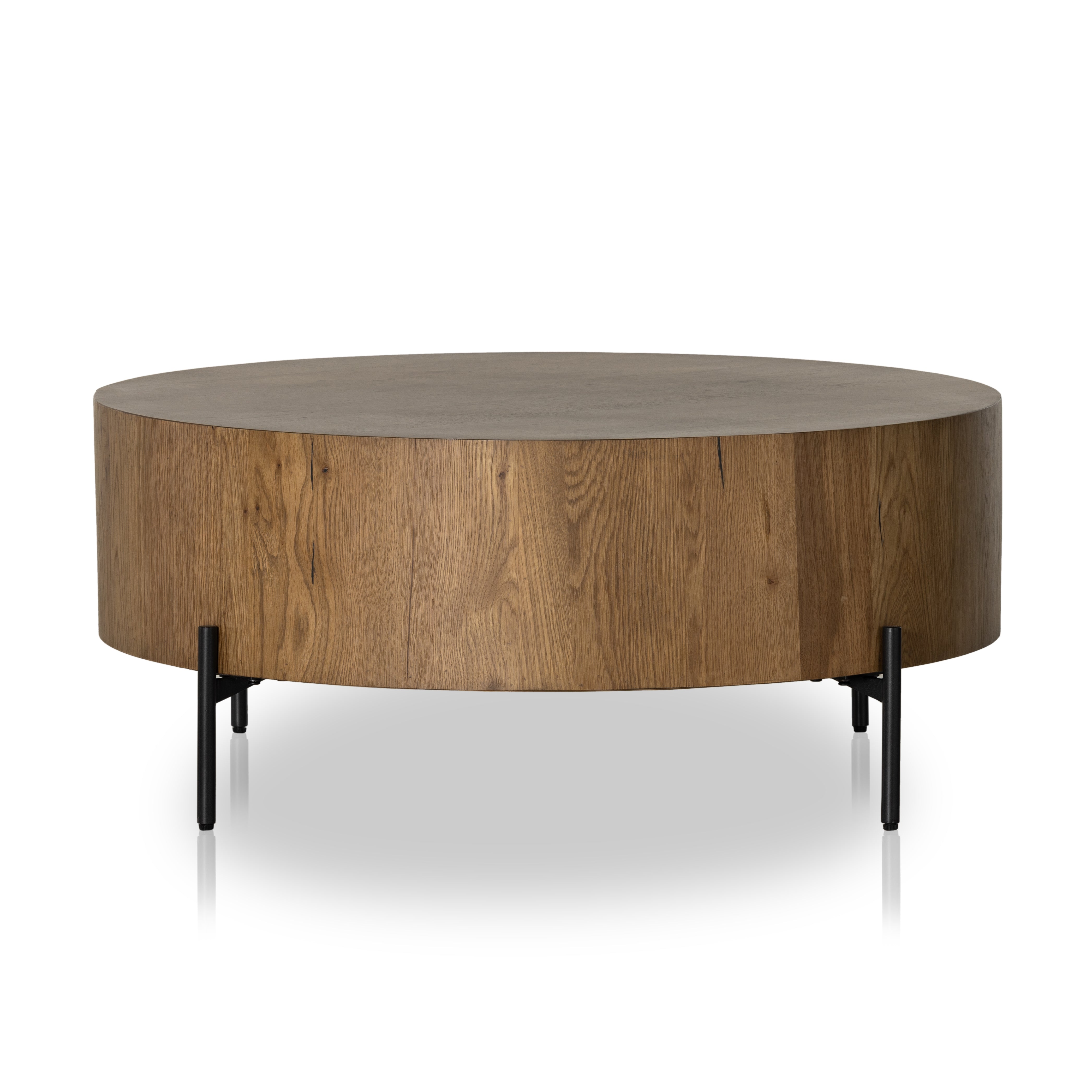 Featuring Eaton Amber Oak Drum Coffee Table by Four Hands at Amethyst Home. no descriptionOverall Dimensions: 38"W x 38"L x 16"H
Collection: HaidenColors: Dark Gunmetal ,Amber Oak ResinMaterials: Iron ,Thick Oak Veneer Weight: 55.12 lbsClearance from Floor: 6.0"Distance Between Legs (Front to Back): 19.75"Distance Between Legs (Side to Side): 19.75"Tabletop Thickness: 10.0". Amethyst Home provides interior design, new construction, custom furniture, and area rugs in the Nashville metro area.