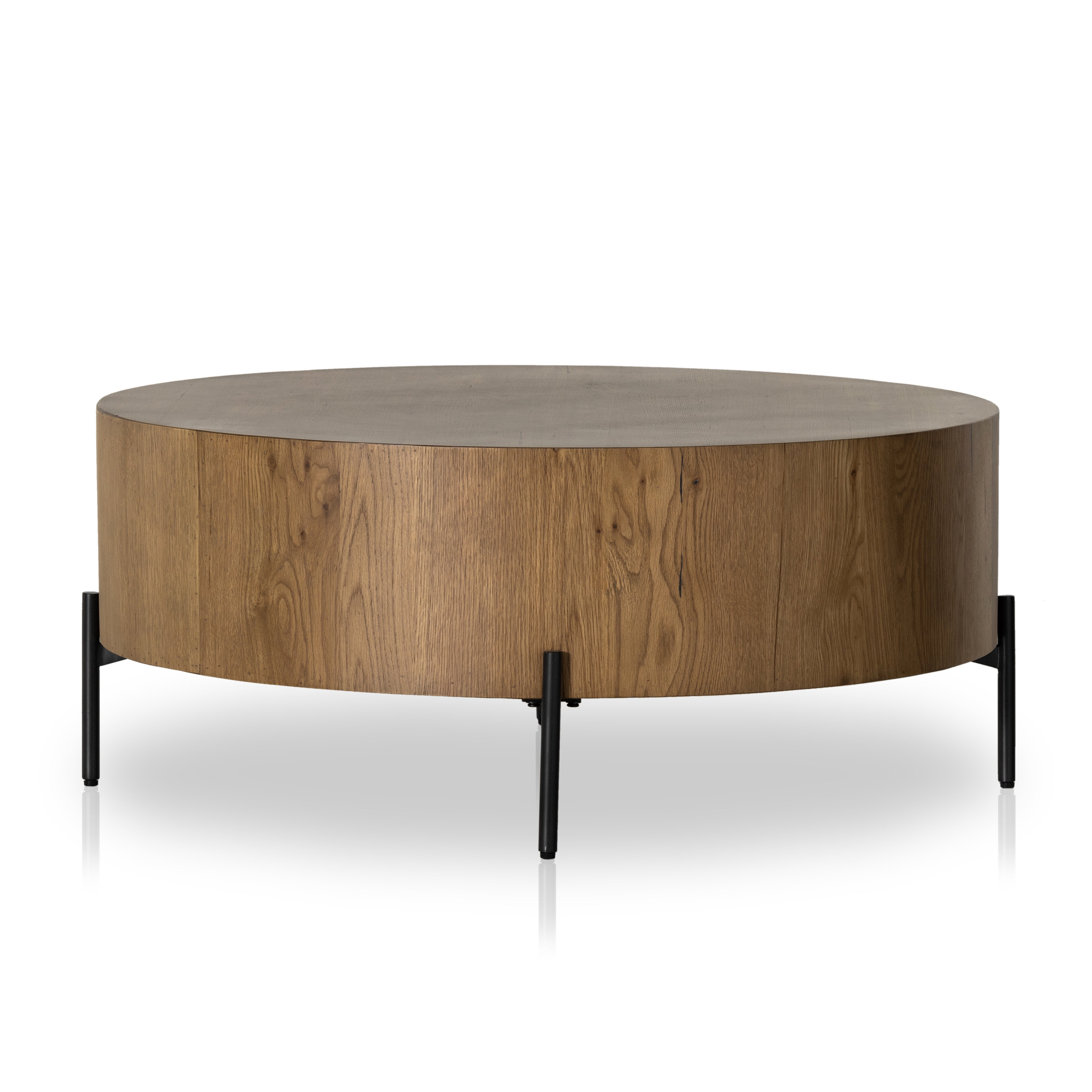 Featuring Eaton Amber Oak Drum Coffee Table by Four Hands at Amethyst Home. no descriptionOverall Dimensions: 38"W x 38"L x 16"H
Collection: HaidenColors: Dark Gunmetal ,Amber Oak ResinMaterials: Iron ,Thick Oak Veneer Weight: 55.12 lbsClearance from Floor: 6.0"Distance Between Legs (Front to Back): 19.75"Distance Between Legs (Side to Side): 19.75"Tabletop Thickness: 10.0". Amethyst Home provides interior design, new construction, custom furniture, and area rugs in the San Diego metro area.