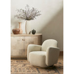 Featuring Enya Gibson White Swivel Chair by Four Hands at Amethyst Home. With soft volume and exaggerated curves, the Enya Gibson White Swivel Chair is upholstered with high-performance fabric atop a plinth-style swivel base. Performance fabrics are specially created to withstand spills, stains, high traffic and wear, ensuring long-term comfort and unmatched durability.
Overall Dimensions: . Amethyst Home provides interior design services, furniture, rugs, and lighting in the Charlotte metro area.