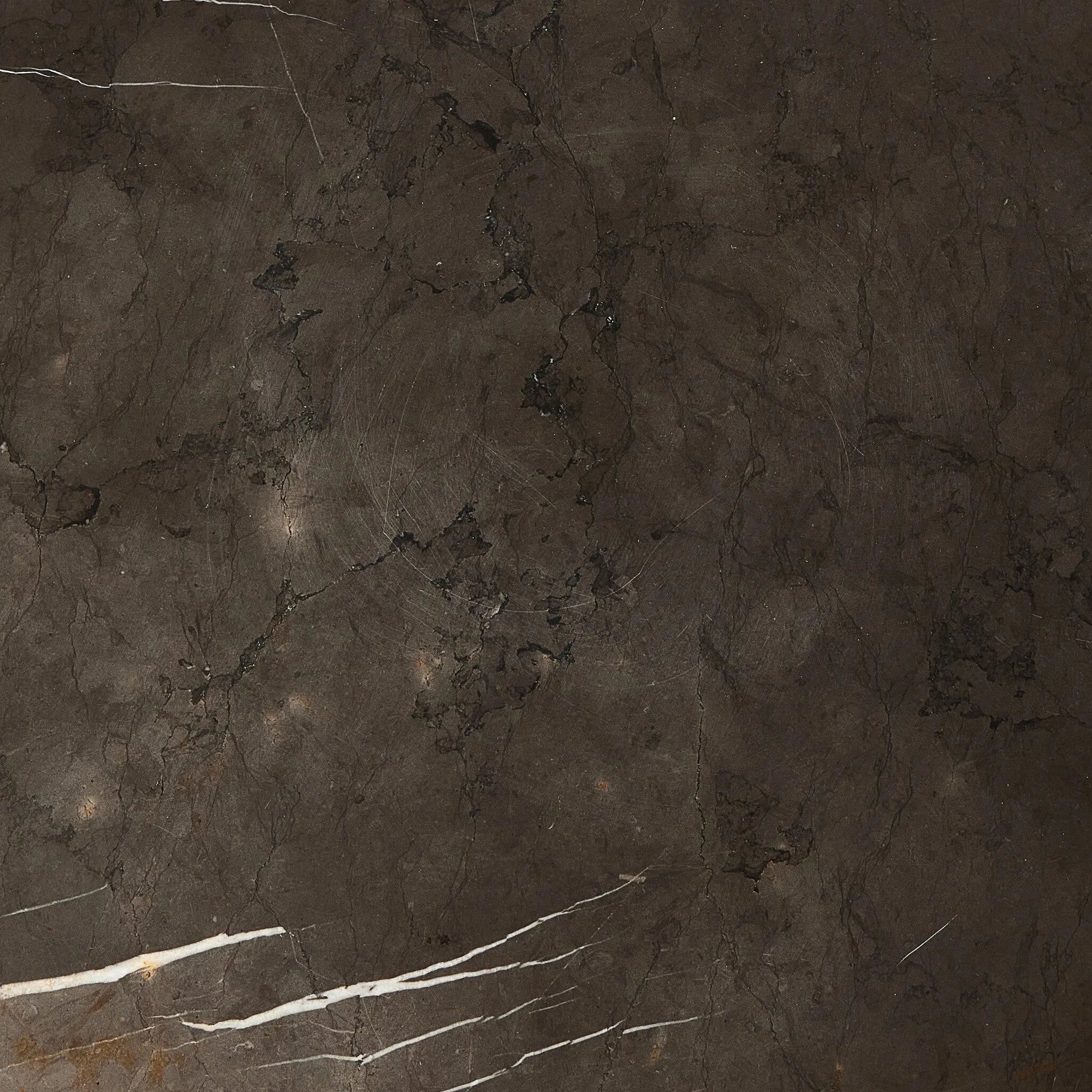 Inspired by Roman columns, a versatile end table of grey Italian marble works a sophisticated touch into any room.Collection: Elemen Amethyst Home provides interior design, new home construction design consulting, vintage area rugs, and lighting in the Miami metro area.