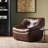 Featuring Farley Conroe Cigar Swivel Chair by Four Hands at Amethyst Home. Modern meets vintage on a 360-degree swivel. Designed with comfort in mind, this armless seating style is upholstered in a vintage-like top-grain leather with lustrous highs and lows. Blind tufting and subtly flared sides offer a true "sink-in" seating experience, while a 360-degree swivel adds modernit. Amethyst Home provides interior design, new construction, custom furniture, and area rugs in the Laguna Beach metro area.